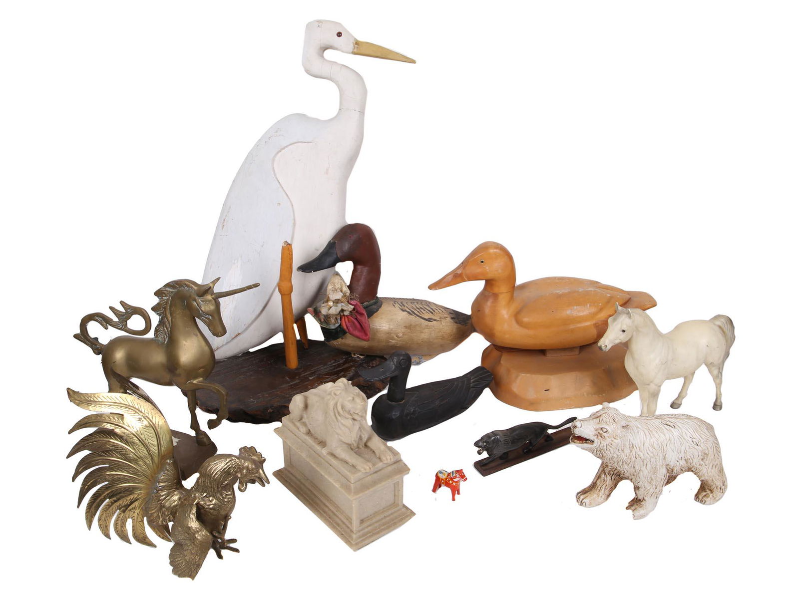 ANTIQUE AND VINTAGE ANIMAL FIGURINES, SCULPTURES: The lot includes: a resting lion marble statue by Edward Clark Potter, American, 1857 - 1923. The New York Library Lions. Carved from Tennessee pink marble, 1911. The New York Public Library, Astor, L