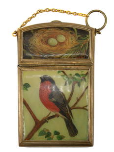 ANTIQUE FRENCH ROBERT LINZELER CIGARETTE CASE: An antique French gold tone metal and enameled cigarette case. The case consists of two sections, decorated with enamel and hand-painted images of a bullfinch on a branch in the lower part, a nest wit