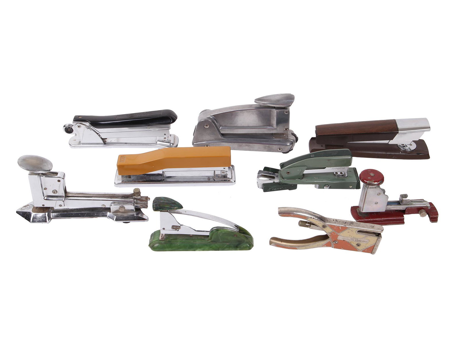 COLLECTION OF VINTAGE RETRO AMERICAN STAPLERS: The lot includes a vintage ACE Fastener Co. Chicago stapler, ACE Fastener Co. Contour V Model 455, Star Paper stapler, three vintage retro staplers by Swingline, Arrow Fastener Inc, New York stapler, 