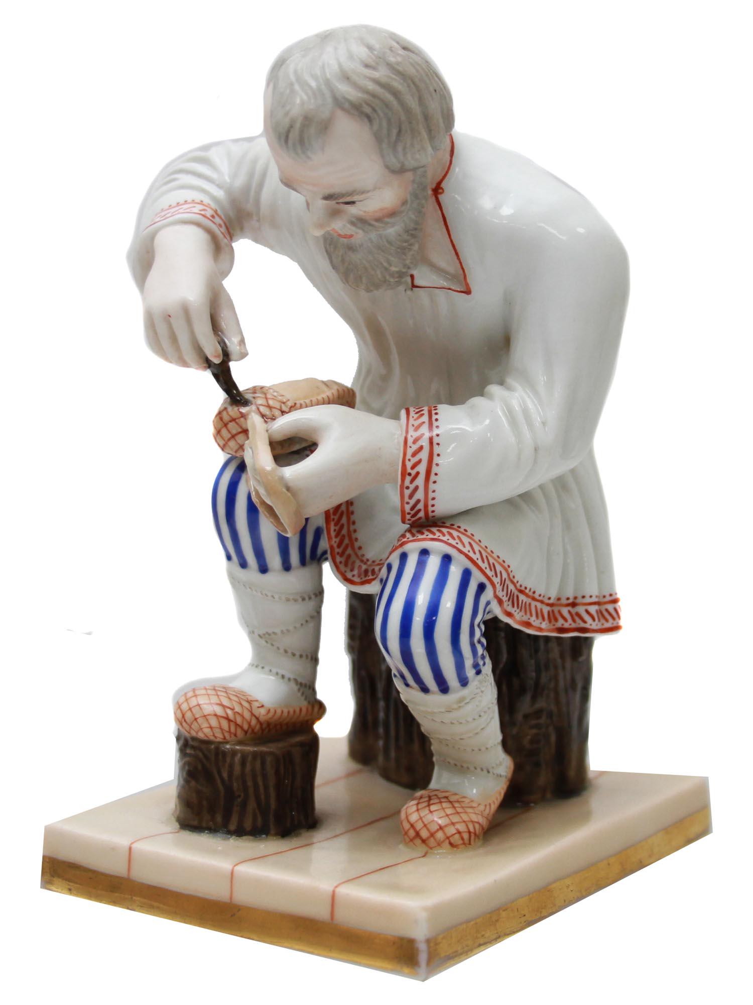 AN ANTIQUE RUSSIAN PORCELAIN FIGURE BY POPOV (1 of 7)