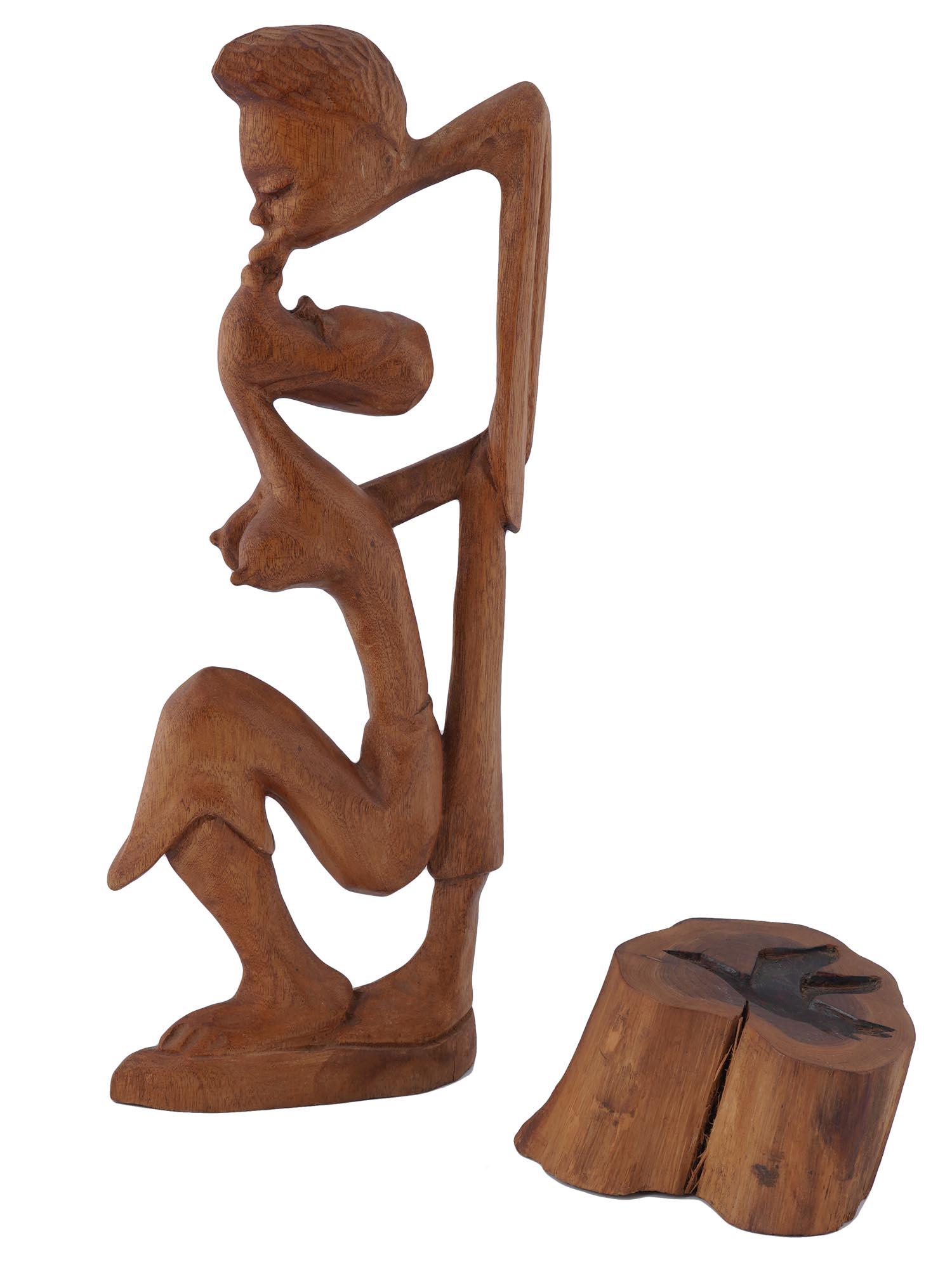VINTAGE HAND CARVED AFRICAN EROTIC WOOD FIGURINE: A vintage African style wooden sculpture depicting a naked kissing couple. Sophisticated rhythmical composition. The lot also includes a carved wood mold of a bird. Exotic Erotic Art For Interior Desi