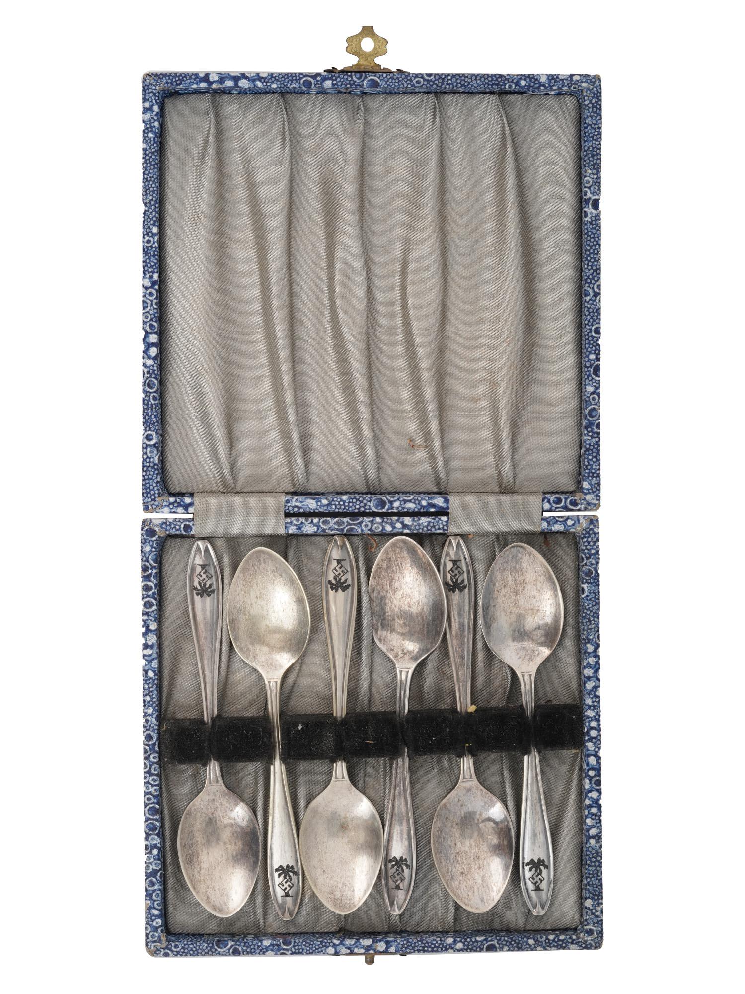GERMAN WWII AFRICAN CAMPAIGN TEA SPOONS SET IOB: A set of six WWII Nazi German EPNS A1 silver plated tea spoons made in England and decorated with German Africa Corps nielloed emblems on the handles. Each utensil is marked on the reverse. The set pr