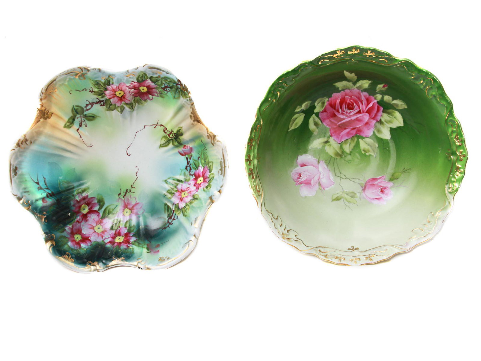 A PAIR OF ROYAL BAYREUTH PORCELAIN FLOWERS BOWLS: A pair of Bavarian Royal Bayreuth porcelain bowls decorated with curved and gilded rims and hand-painted flowers inside and on the sides. One bowl numbered, # 25 04481, on the bottom. Circa: the early