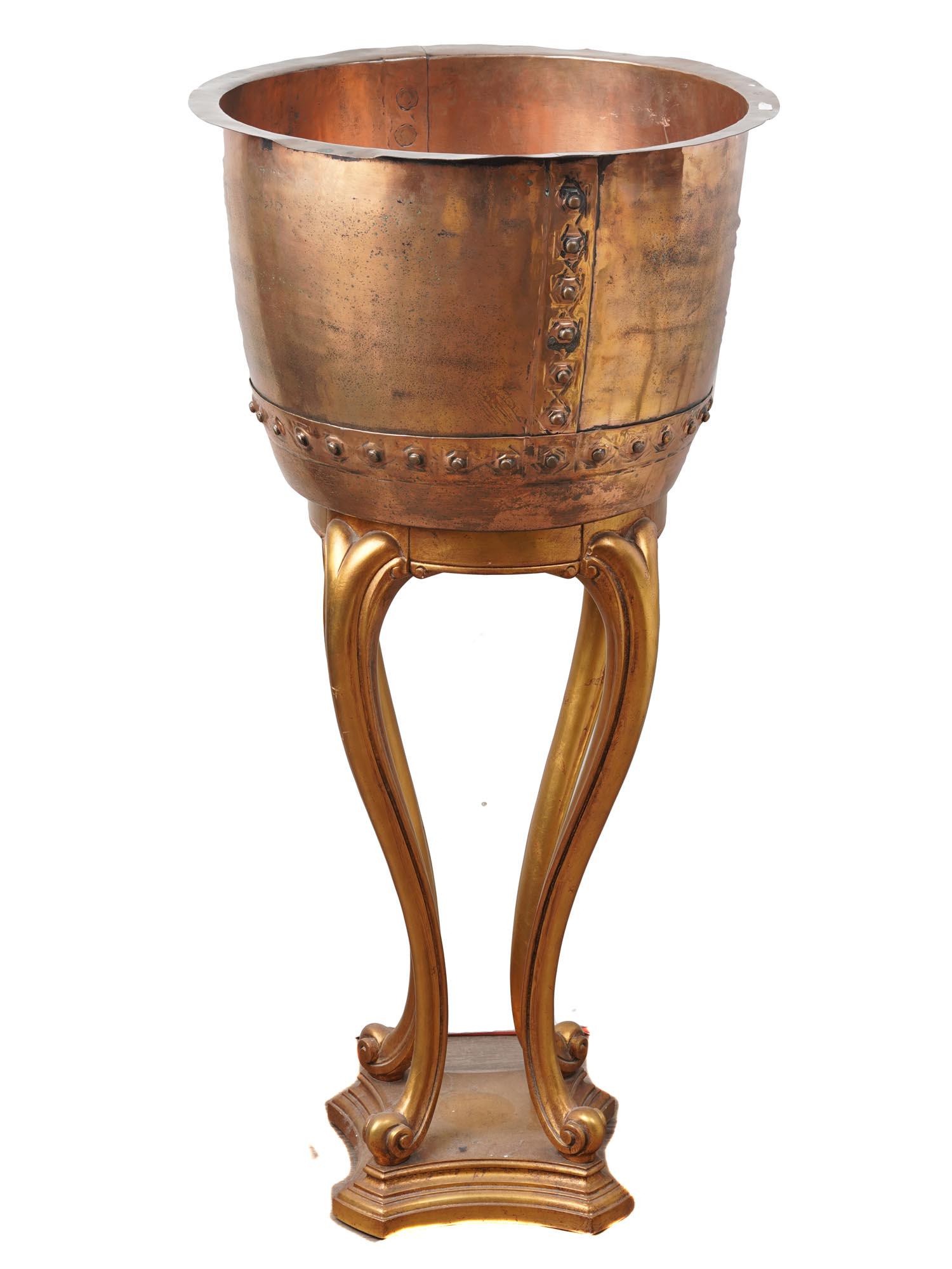 VINTAGE COPPER PLANTER WITH A WEIMAN WOODEN STAND: A large polished copper planter mounted on a gilt wooden stand marked: Weiman Tabbes, Heirloom Quality, 440-3101. Vintage Decorative Objects, Planters, Cachepots and Jardinieres For Home Decor. Dimens