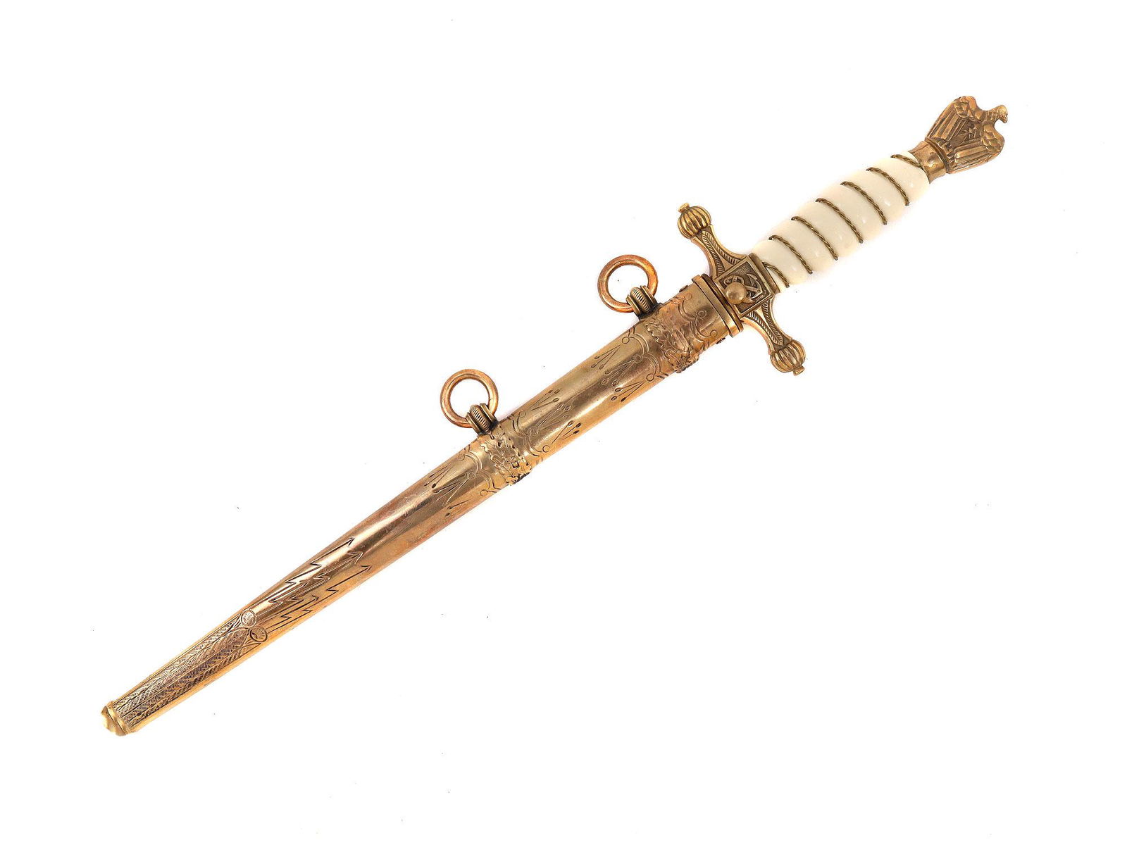 A GERMAN WWII KRIEGSMARINE NAVAL OFFICER DAGGER: A German Third Reich Kriegsmarine officer dress dagger. The grip is covered with white cellulose and decorated with brass wired bound. The figural pommel features a brass eagle holding a swastika, bra
