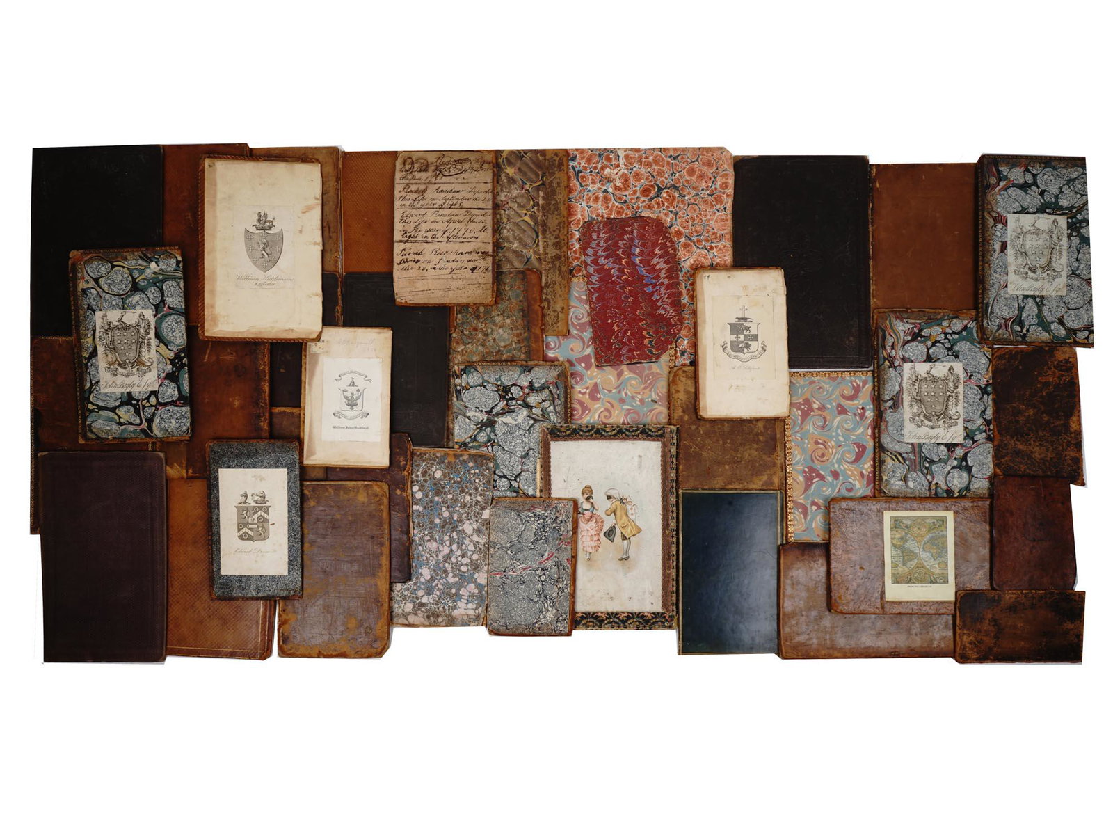 EX LIBRIS MARBLE BOARDS AND LEATHER COVER SCRAPS: A huge collection of antique book covers including made of marbled boards, leather cover scraps with impressed initials, printed ex libris items depicting the coat of arms of owners, and more. Antique
