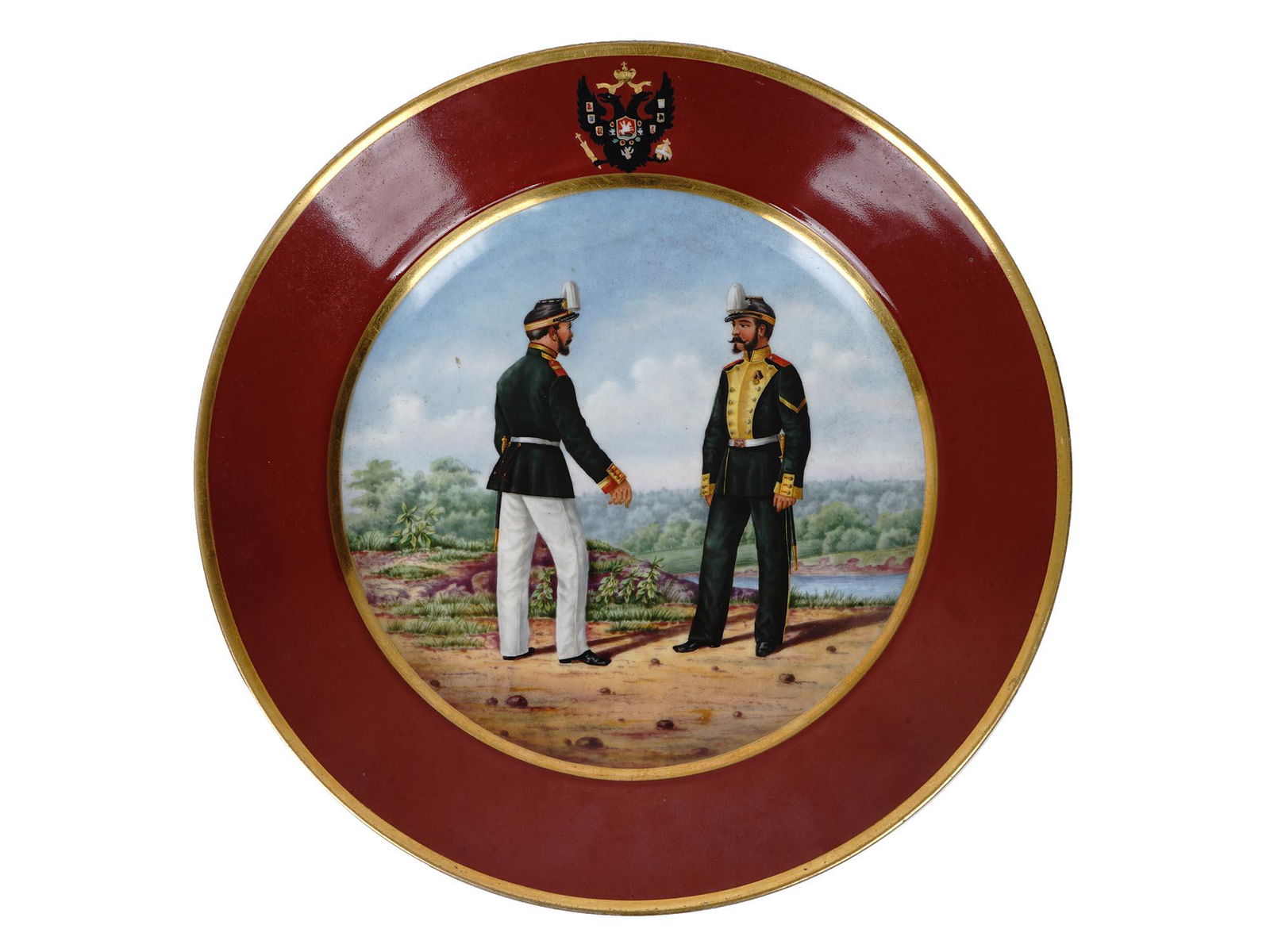 ANTIQUE RUSSIAN PORCELAIN IMPERIAL MILITARY PLATE: An antique Russian porcelain decorative military plate depicting a group portrait of a non-commissioned officer of the Izmailovsky Life Guards Regiment and a private of the Lithuania Life Guards Regim
