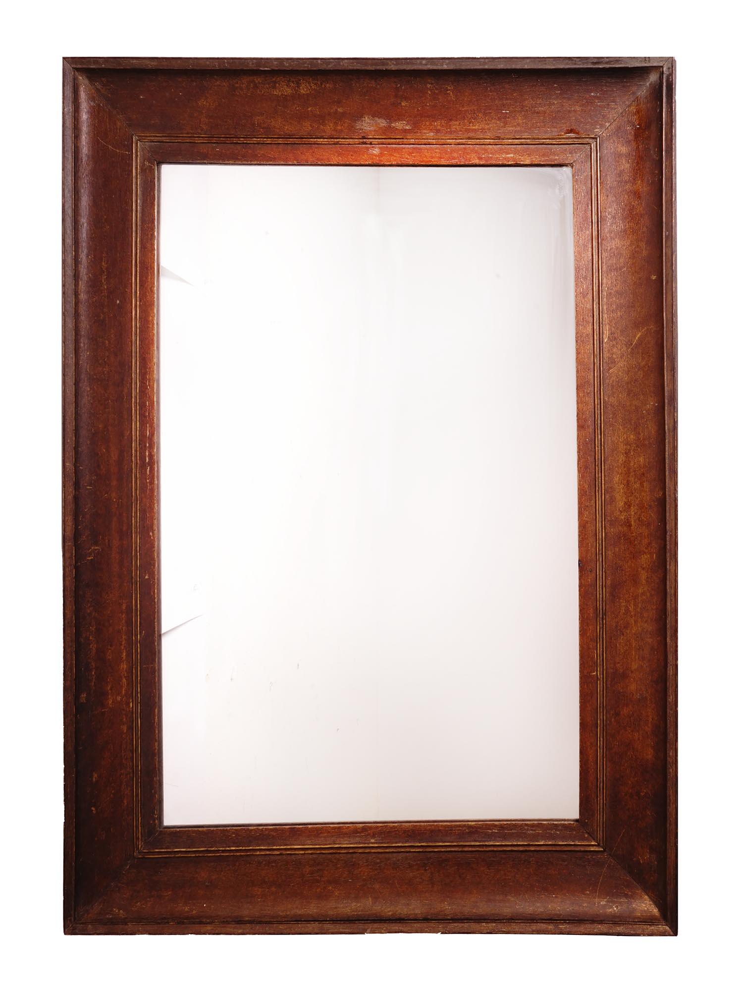 A LARGE ANTIQUE MIRROR WITH A WOODEN FRAME (1 of 7)