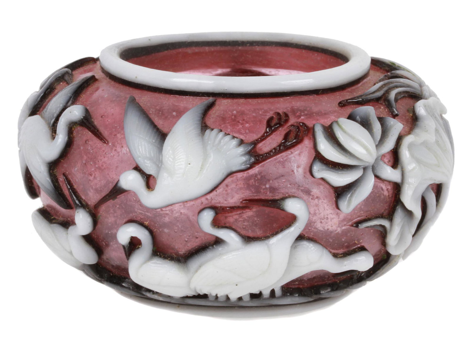 ANTIQUE CHINESE PEKING AMBER GLASS BOWL: An antique Chinese Peking amber glass bowl depicting a flock of cranes and some floral images with a white overlay and a white rim. Circa the early 20th century. Antique Asian Art Collectibles. Dimens