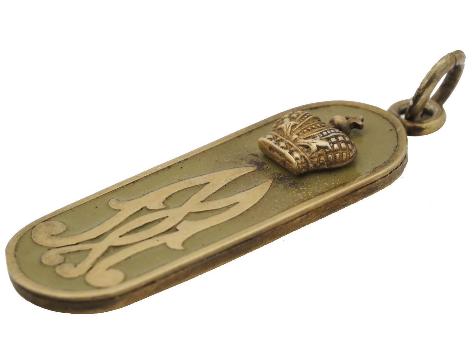 RUSSIAN SILVER ENAMEL MILITARY PENDANT: A Russian gilt silver rectangular pendant, shoulder strap token. Decorated with blue enamel, silver Imperial Crown, and monogram. Made in a cloisonne technique. Marked on the loop with Russian hallmar
