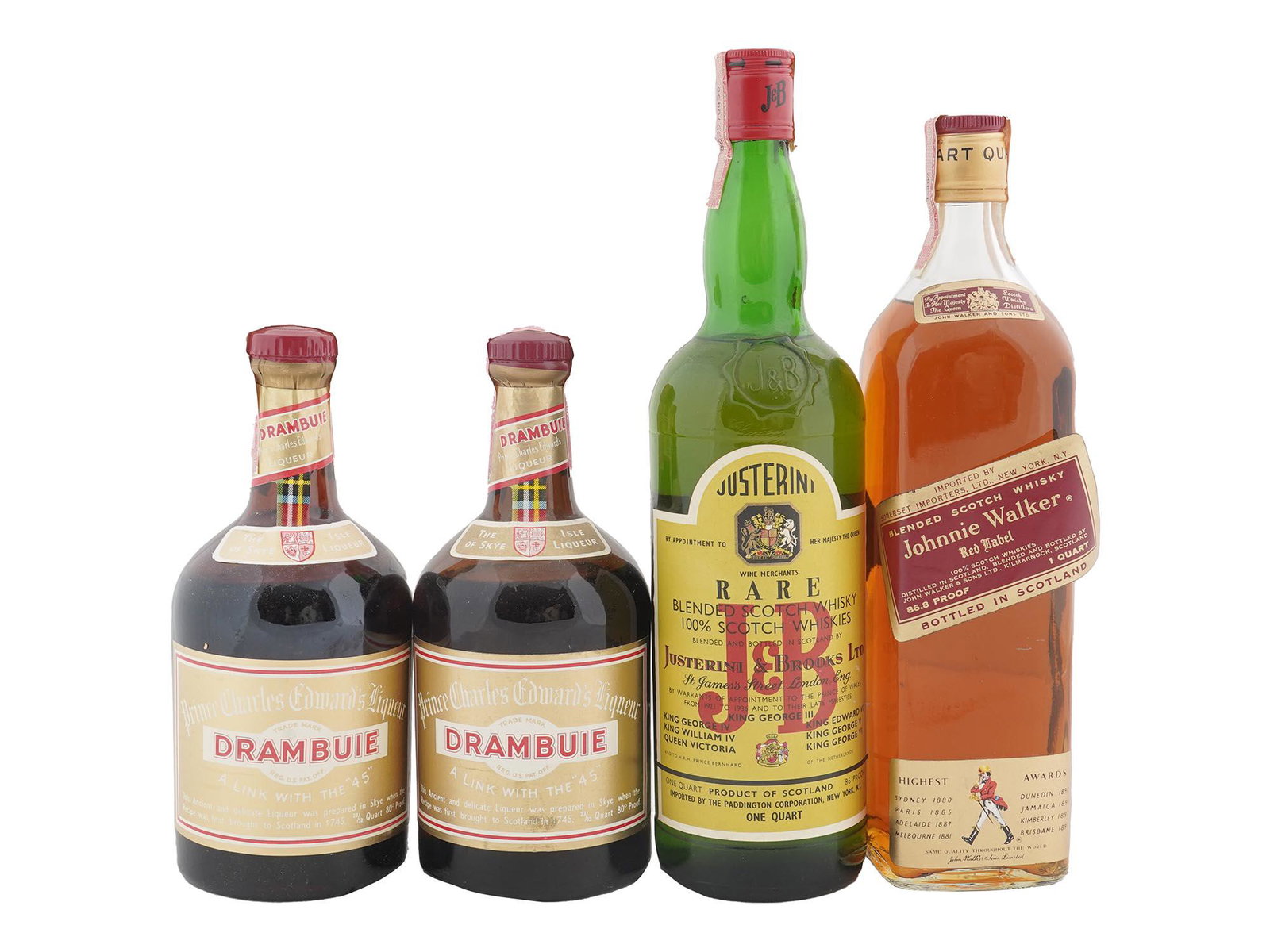 FOUR VINTAGE WHISKY LIQUOR BOTTLES DRAMBUIE J&B: A set of four vintage sealed whisky and liqour bottles from variuos countries. Two bottles of Drambuie Prince Charles Edward's Liqueur, The Isle of Skye Liqueur, A Link With The 45, made in Scotland. 