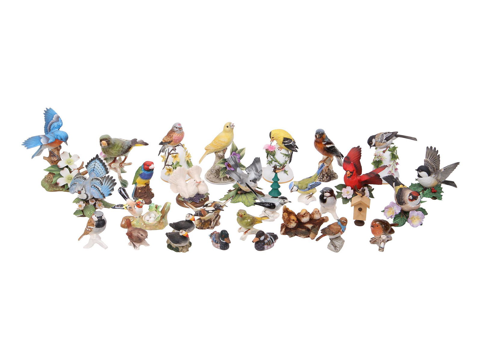 ANDREA BY SADEK W GOEBEL PORCELAIN BIRD FIGURINES: A big lot of vintage handpainted porcelain bird figurines by W. Goebel, Lenox Japan, Andrea by Sadek, The Franklin Mint. A total of 31 items. Each figurine has a hallmark on the bottom. Collectible Vi