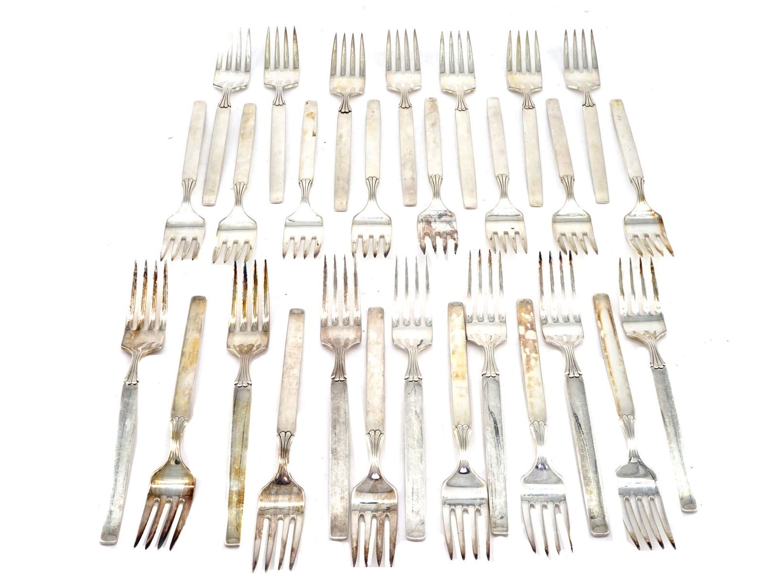MID CENTURY TWILIGHT COMMUNITY FLATWARE BY ONEIDA: A lot of silver-plated flatware by Oneida, American manufacturer and seller of tableware and cutlery. A total of 87 pieces including 36 spoons, 28 forks, 12 knives, two butter knives, two tea spoons,