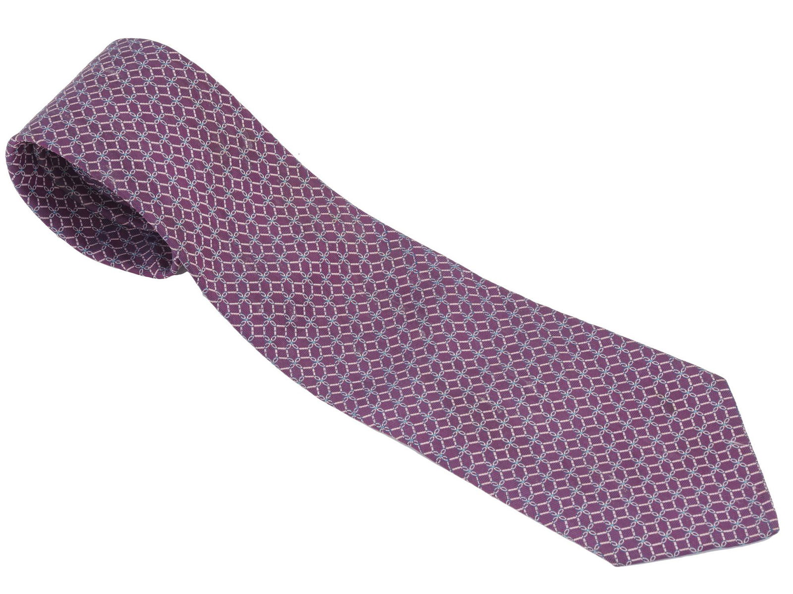 MODERN FRENCH HERMES PARIS MALE SILK TIE: A Modern French Hermes Paris male silk tie. The tie is adorned with a geometrical pattern in purple and white shades. Marked with brand logo labels. Authenticity is not guaranteed by auction house. An