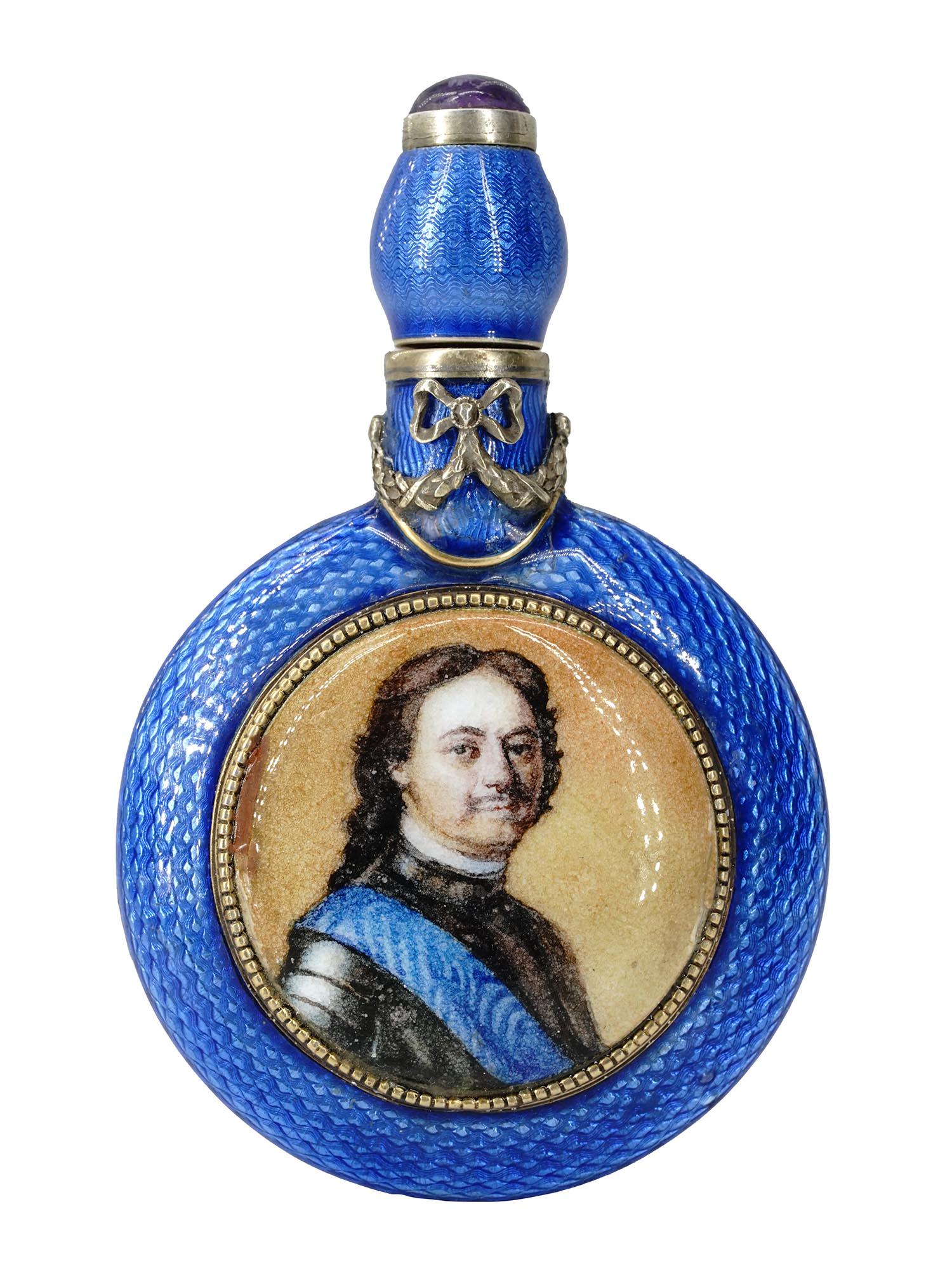 RUSSIAN 84 SILVER PETER THE GREAT PERFUME BOTTLE: A Russian 84 silver and enamel perfume bottle with a stopper. The exterior is covered with a cobalt blue enamel made in the Guilloche technique and adorned with an enameled portrait of Peter The Great