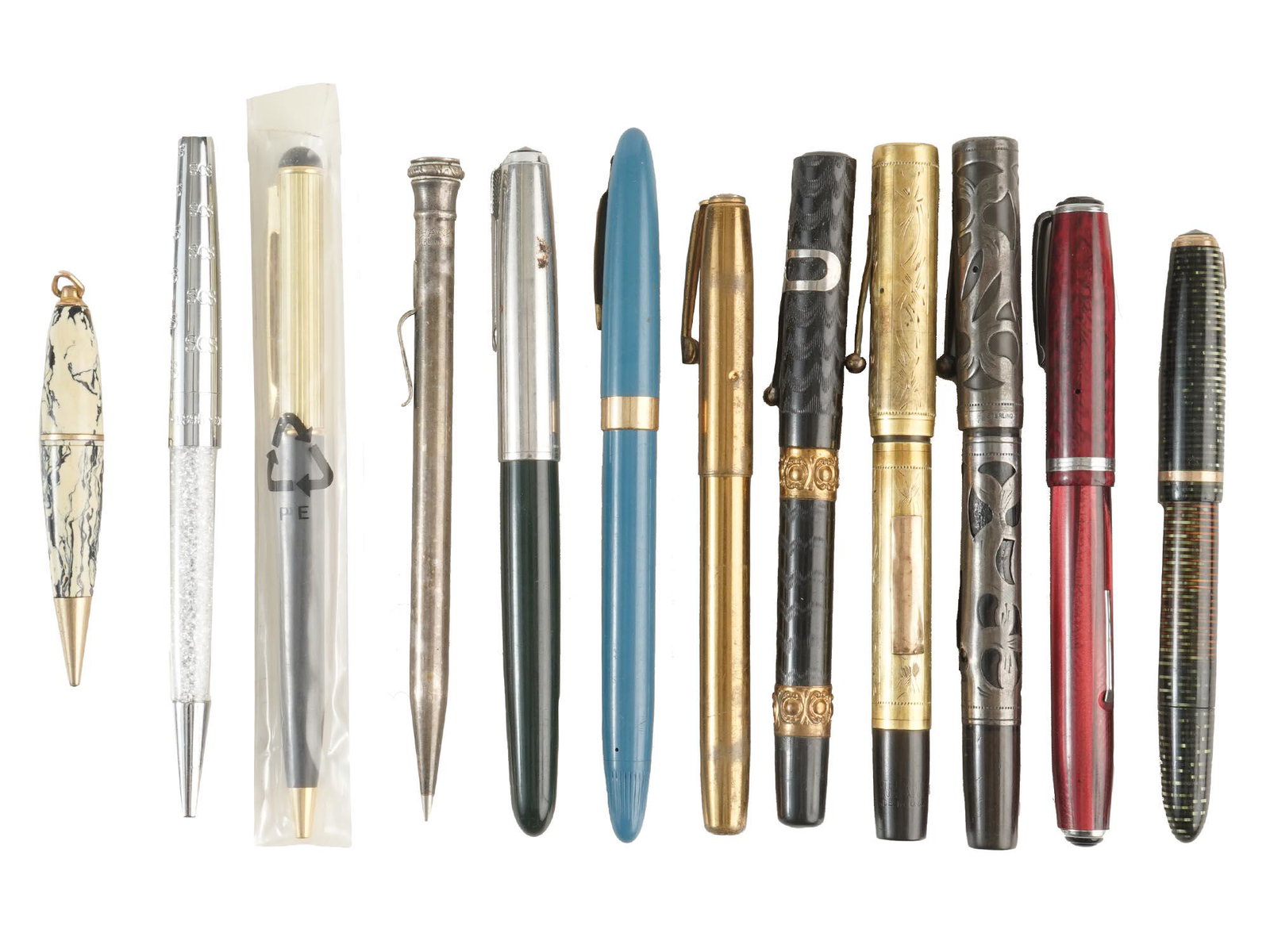 COLLECTION OF THIRTEEN FOUNTAIN BALLPOINT PENS: A collection of thirteen fountain and ballpoint pens. The pens with plastic and metal cases are adorned with etching, engraving, a marble design and others. Circa: 20th century. Vintage and Modern Off