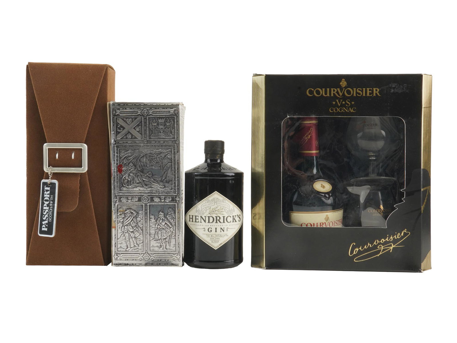 FOUR VINTAGE SEALED ALCOHOL BOTTLES IN BOXS: Four vintage sealed alcohol bottles including a bottle of Passport Scotch Blended Scotch Whisky 750 ml from the 1980s in the original box, a bottle of Cognac Courvoisier VS 700 ml with 2 glasses in th