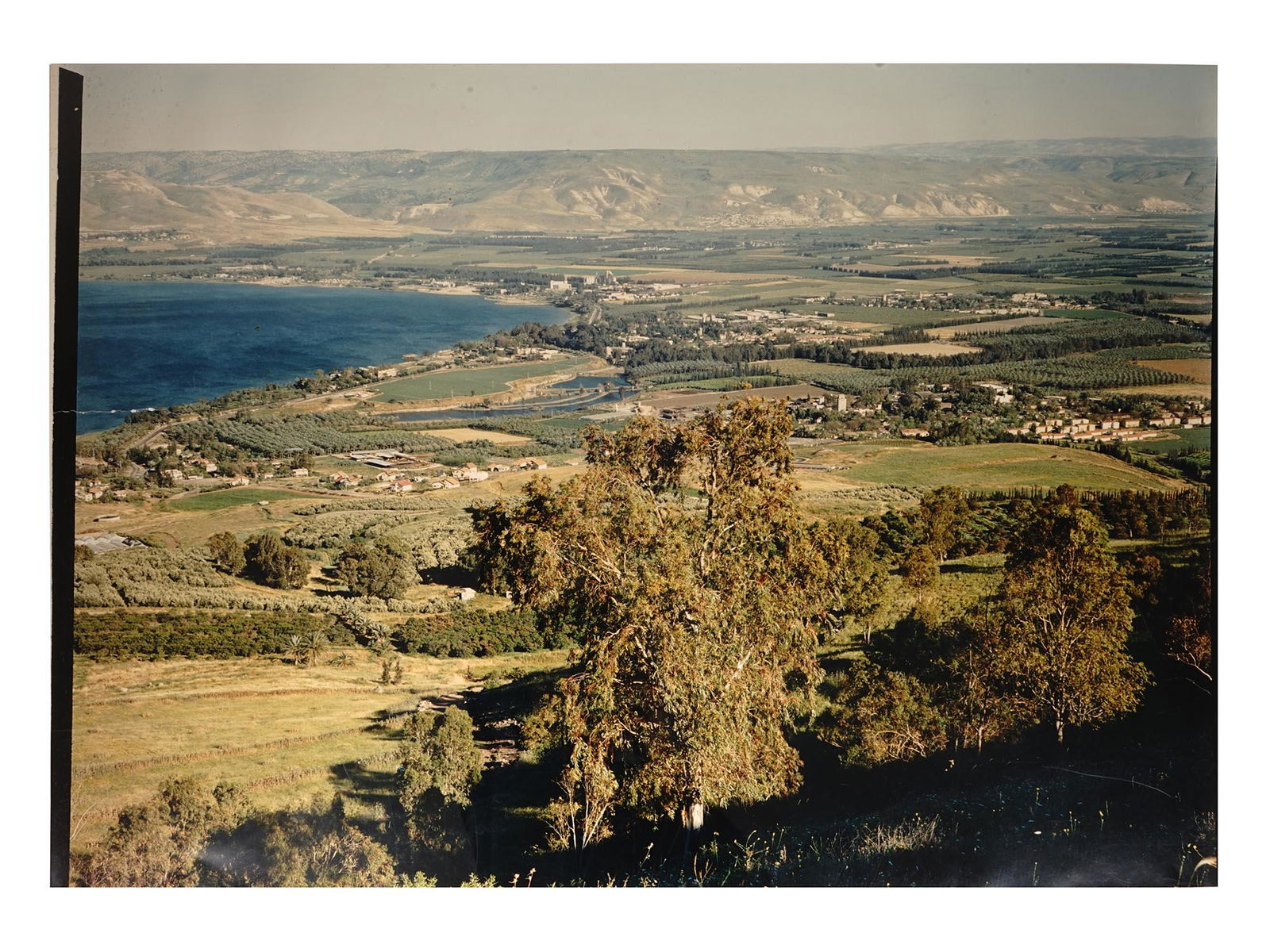 RUSSIAN SOVIET ISRAELI PHOTO SEA BY LEV BORODULIN: Lev Borodulin, Russian Soviet, Israeli, 1923 to 2018, large color landscape photo, Israel Sea of Galilee. Signed by the photographer, titled, and numbered 827, on the back. Circa: 1980s. Lev Abramovic
