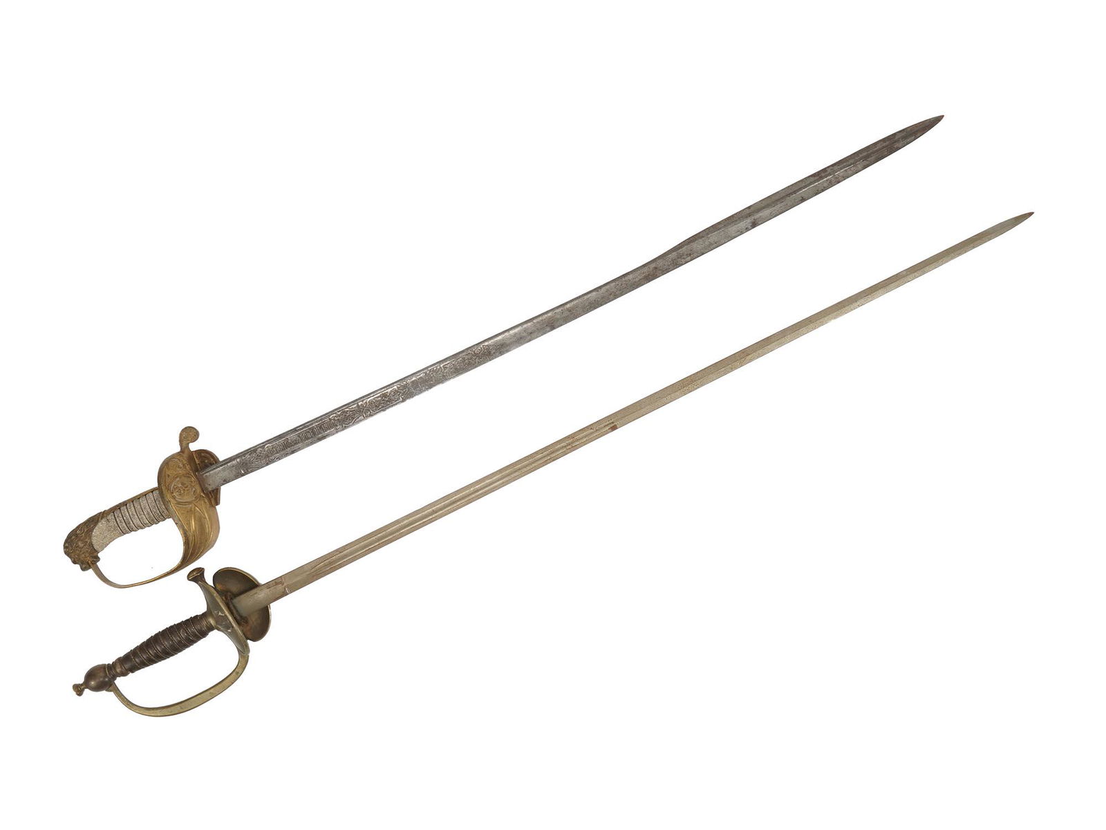 TWO ANTIQUE EUROPEAN NAVAL OFFICER SWORDS SABERS: Two antique European naval officer swords. A British saber with a single edged blade marked Fabrica de Toledo, 1900, and decorated with arabesque etching. A Gothic gilt brass hilt holds a lion head po