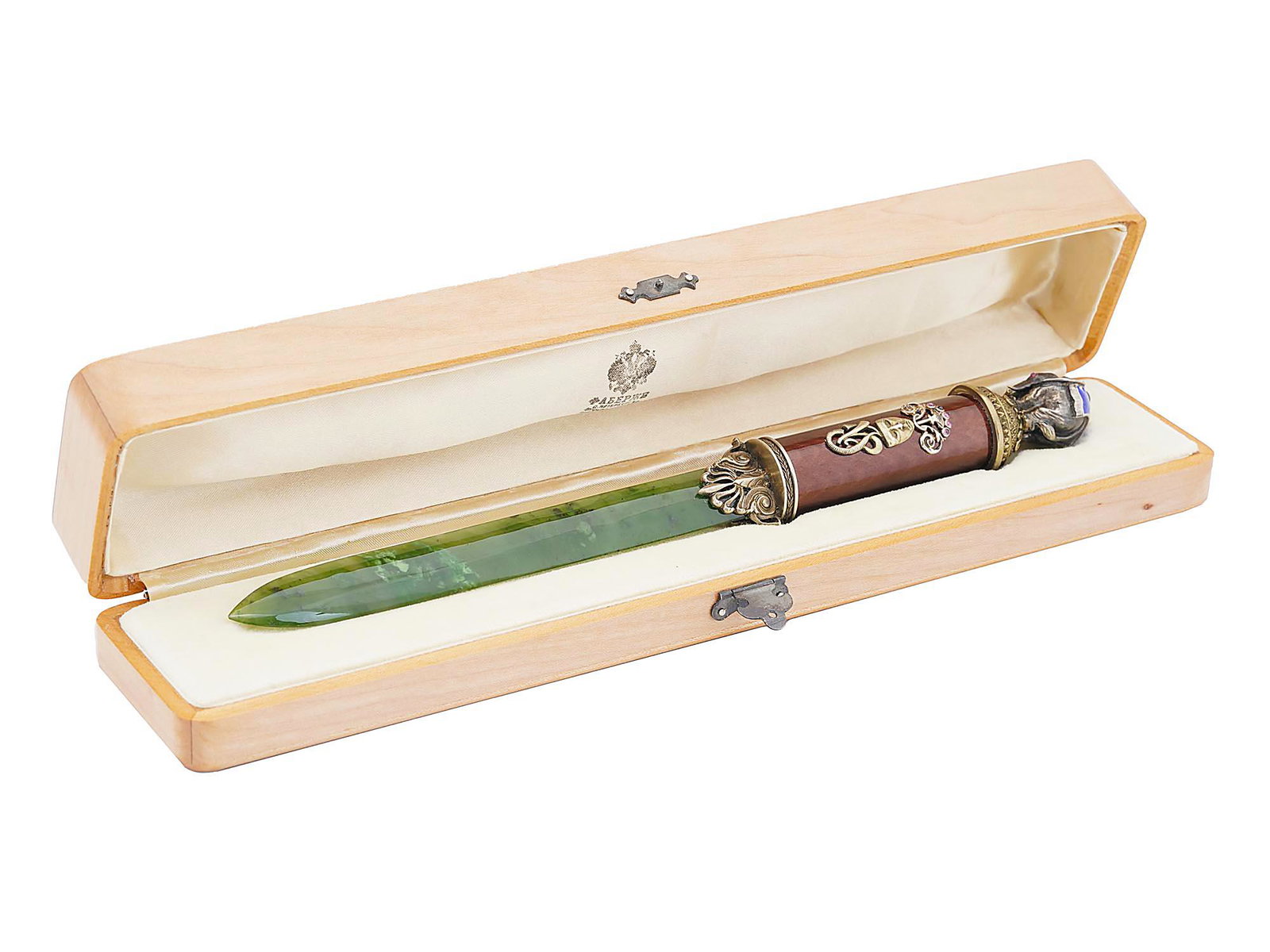 RUSSIAN SILVER ENAMEL NEPHRITE JADE LETTER OPENER: A Russian letter opener with a nephrite jade blade and a silver mounted red guilloche enameled handle holding the decorations set with diamonds. With a silver elephant figure covered with blue guilloc