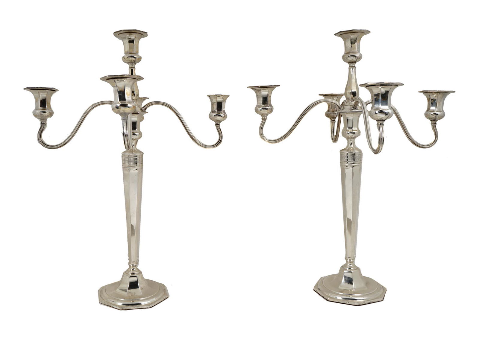 PAIR OF STERLING SILVER FIVE BRANCHES CANDELABRA: A pair of vintage sterling silver candelabra with five light branches. Each candelabra is adorned with an etched floral pattern. Marked with a standard Sterling Silver hallmark and other Assay marks.