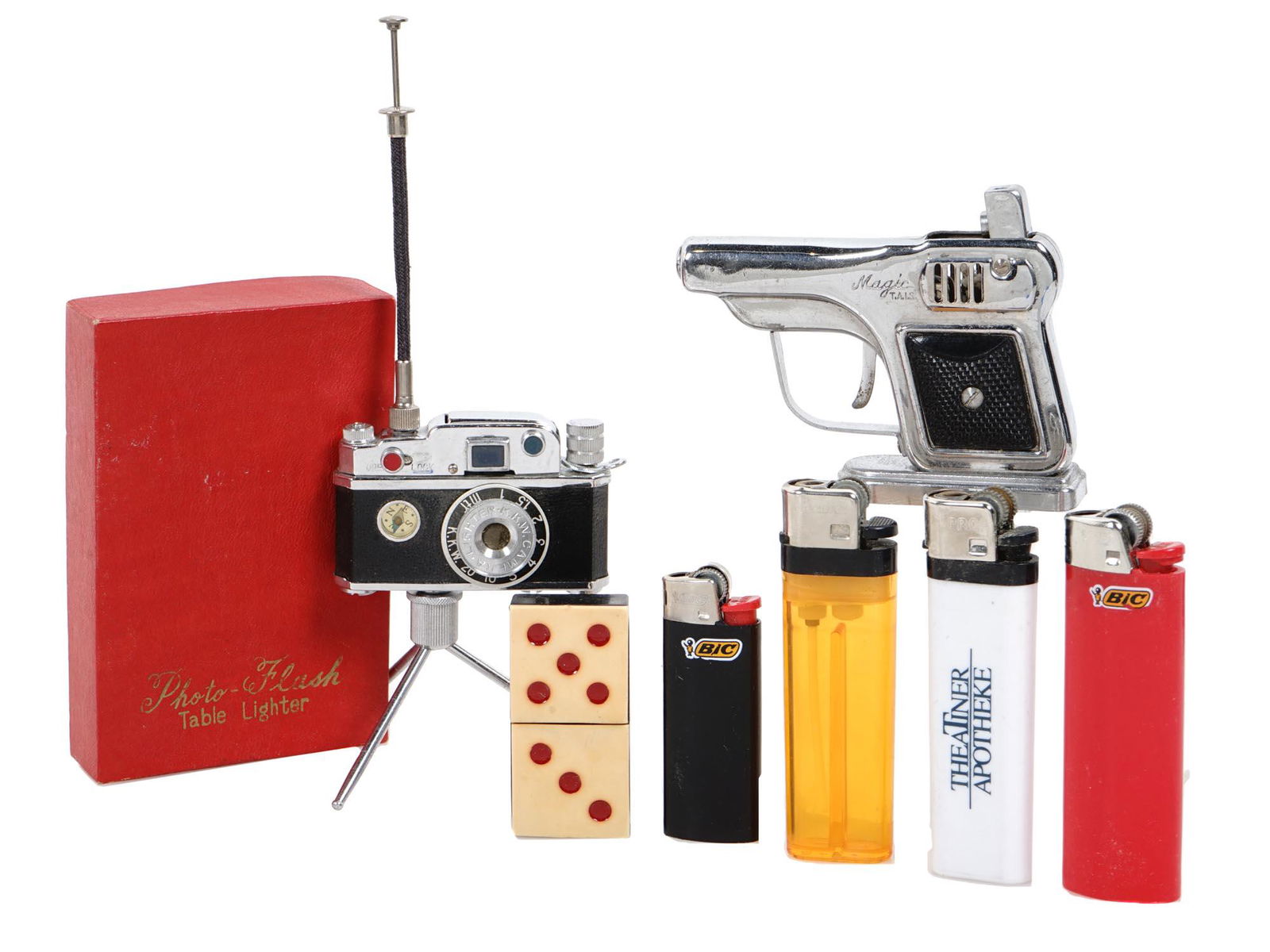 VINTAGE AMERICAN NOVELTY LIGHTER COLLECTION: A vintage table lighter camera made by KKW in the original box, a vintage gun table Magic T.A.I.S lighter with a stand in the original box. Both are from Occupied Japan, circa the 1940s. A vintage nov