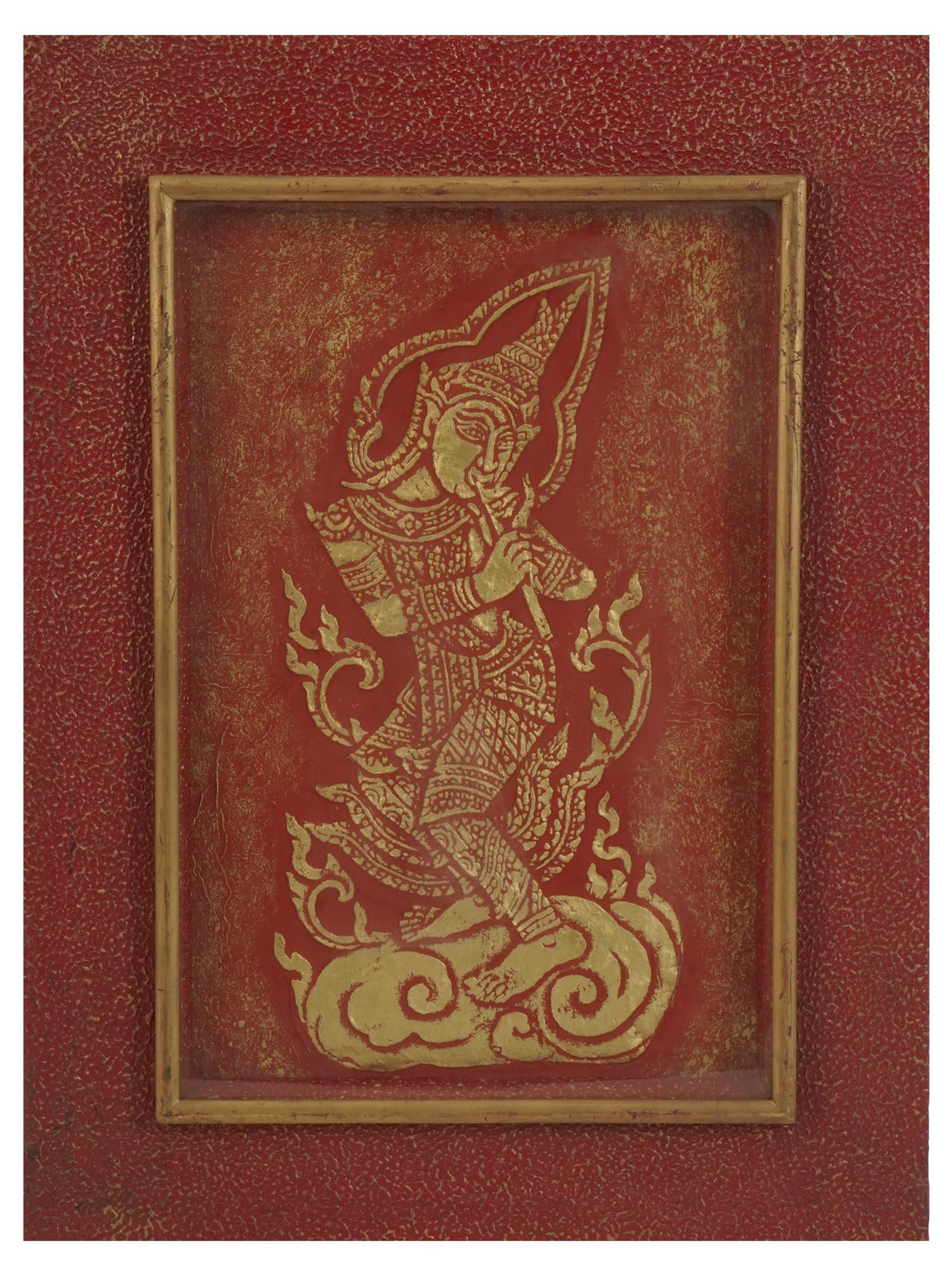 MID CENTURY THAI TEMPLE RUBBING OF RED MUSICIAN: Red cinnabar and gilt brass Buddhist temple rubbing from Thailand. The artwork depicts a Thai musician. Signed Homill on the backside. Red wooden frame. Oriental Buddhist Wall Art, Traditional Thai Te