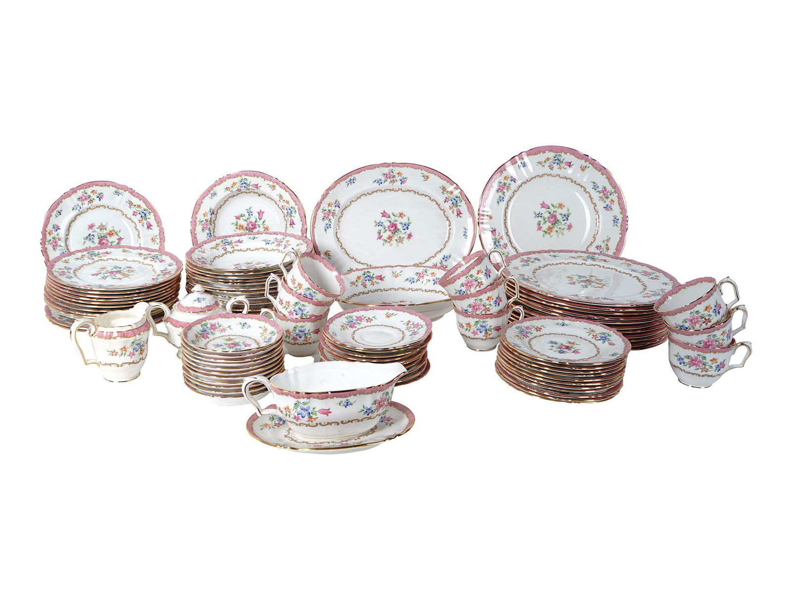 ENGLISH STAFFORDSHIRE FLORAL PINK PORCELAIN SET: A vintage English Staffordshire pink and white porcelain set including dinner and tea serving wares. The set includes cups, plates, saucers, bowls, and milk jugs. The wares are adorned with an enamele