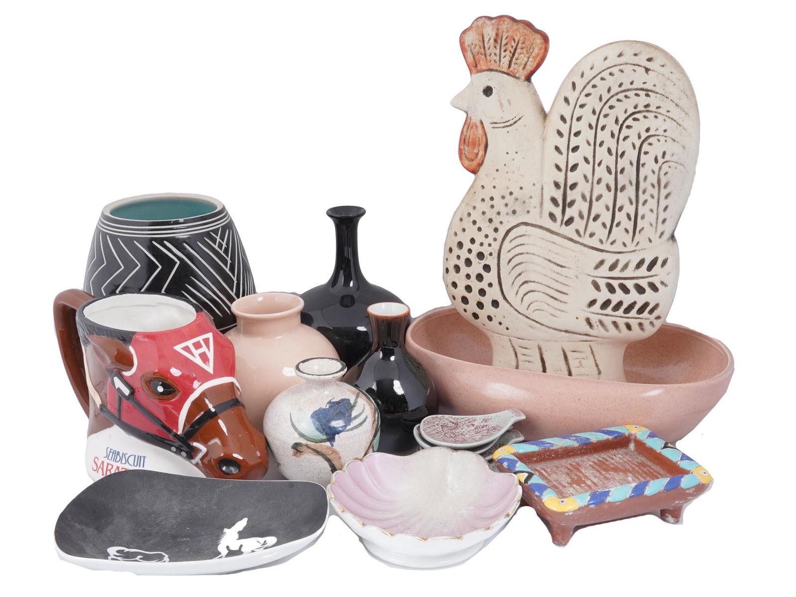 COLLECTION OF VINTAGE HAND MADE POTTERY ITEMS: A large collection of vintage hand made pottery items. Includes a vintage Sea Biscuit Saratoga horse-shaped coffee mug, a small pale pink vase by Poole Pottery, England, marked underside, a miniature