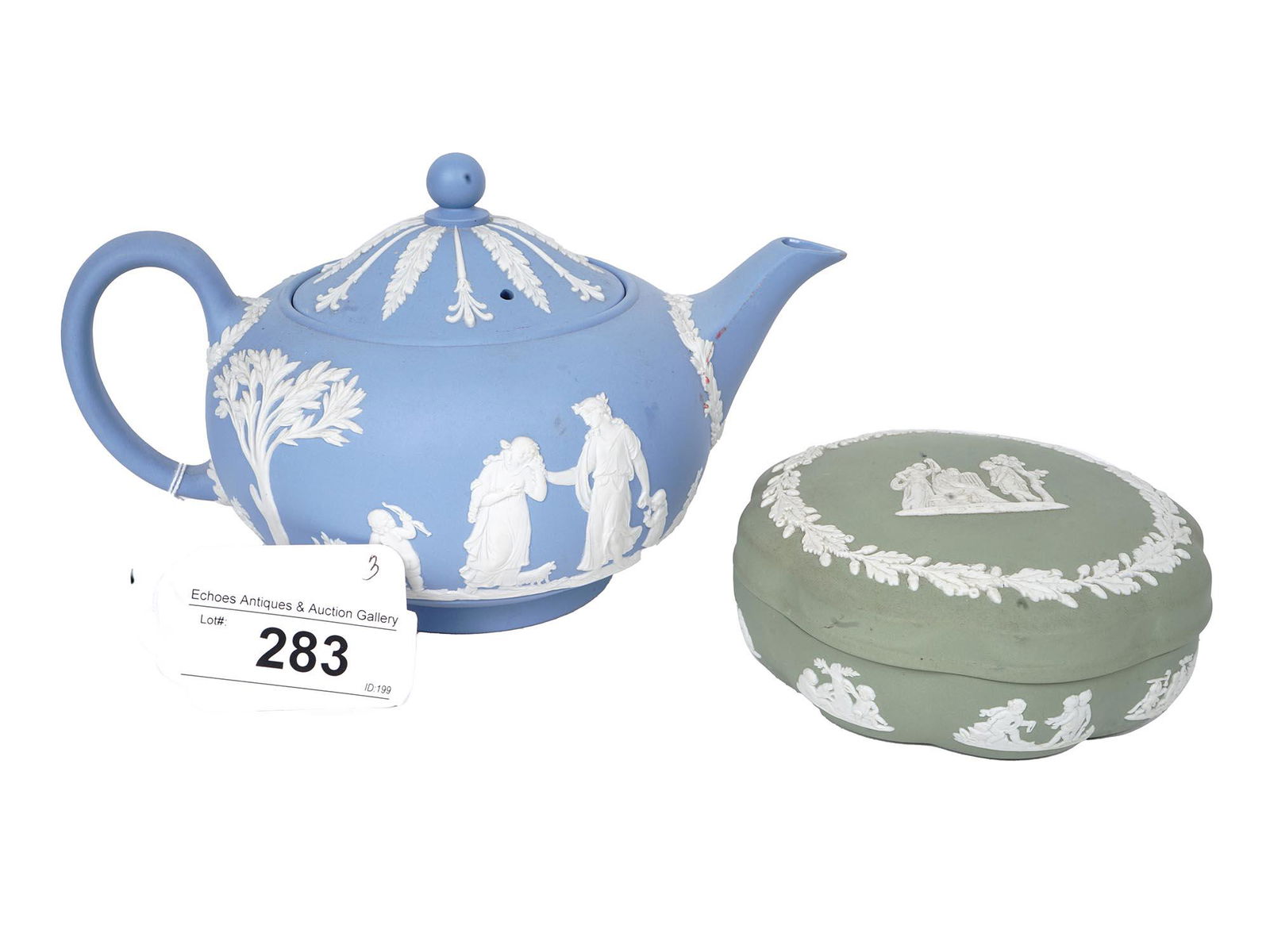 ENGLISH WEDGWOOD BLUE GREEN JASPER WARE TEA SET: An antique English Wedgwood jasperware tea set. The set includes a blue tea pot and an olive green lidded bowl. The wares are decorated with Neoclassical scenes with female figures, children, cherubs,