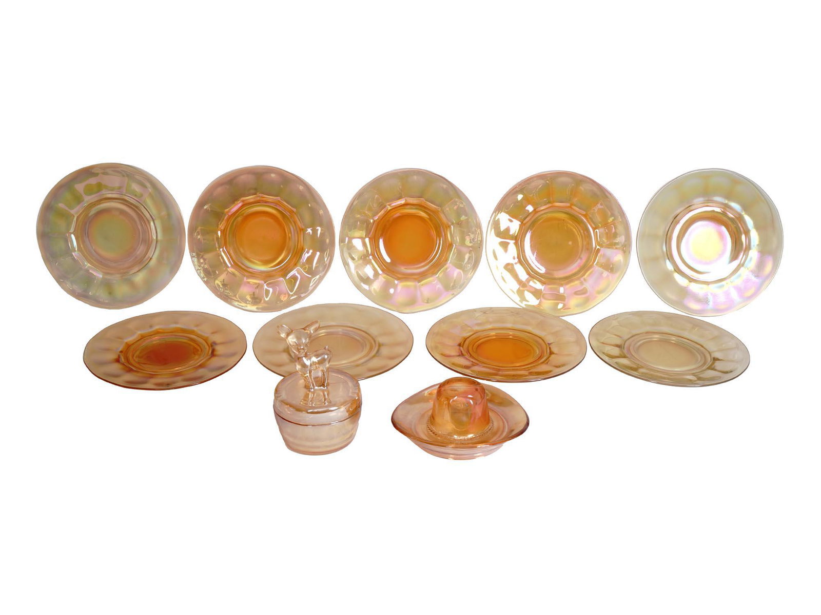 MARIGOLD CARNIVAL GLASS TABLEWARE BY JEANNETTE: A lot of early American glassware dating back to the first half of the 20th century. A total of 11 items including 9 saucers, a cowboy hat-shaped ashtray, and a fawn powder jar with lid. Manufactured 