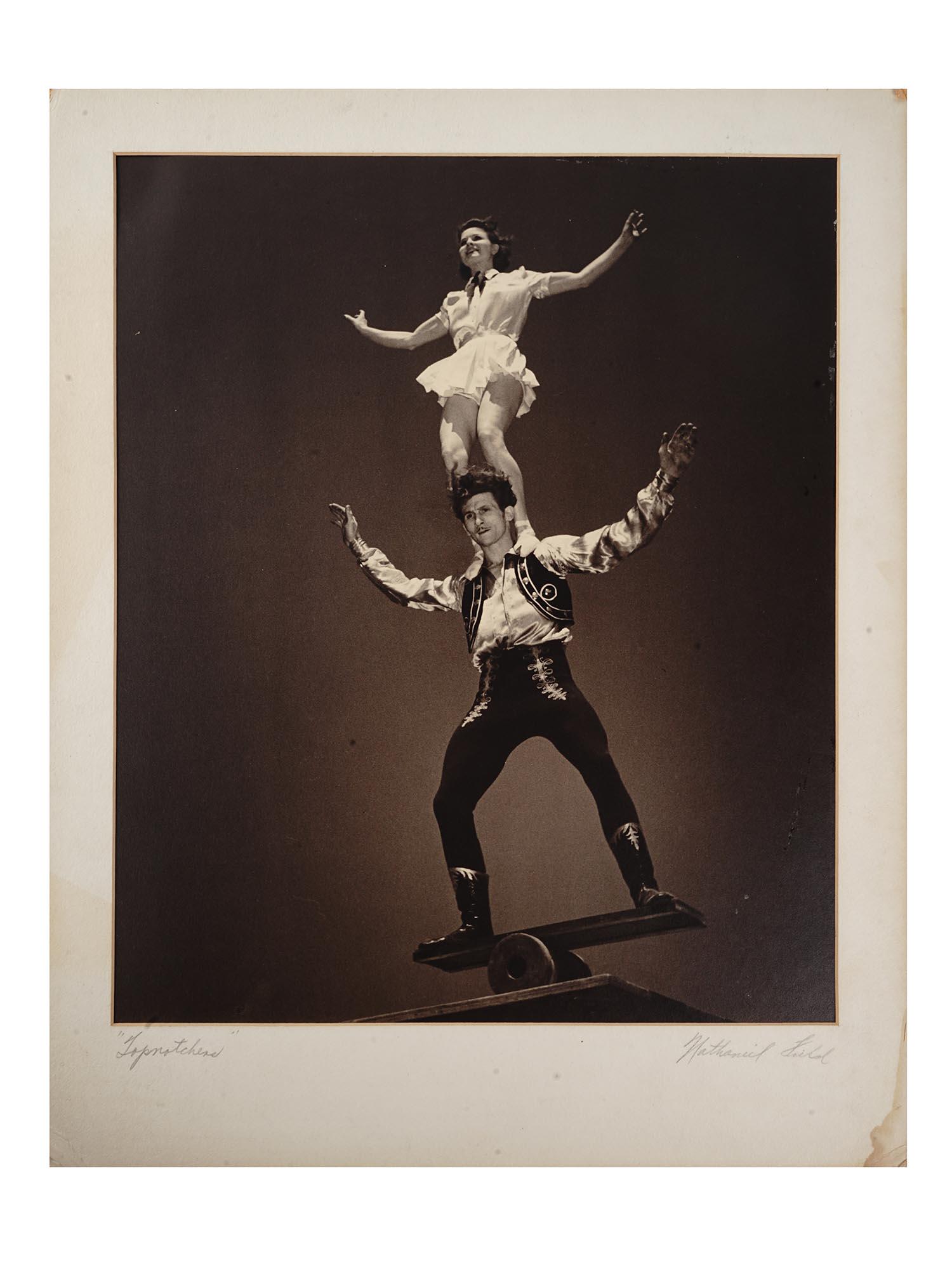 VTG AMERICAN TOPNOTCHERS PHOTO BY NATHANIEL FIELD: Nathaniel Field, American, 20th century, rare black and white photograph mounted on a laid paper depicting a group portrait of circus artists titled Topnotchers. Entitled and signed in pencil lower. C