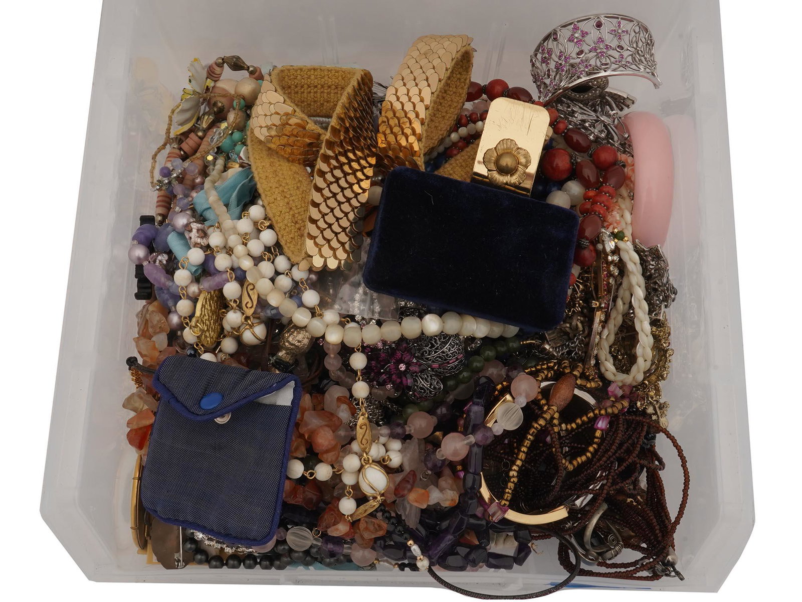 COLLECTION OF VINTAGE AND MODERN COSTUME JEWELRY: A collection of vintage Victorian, Art Deco, Modern, and Folk Art style costume jewelry. The collection includes a group of necklaces and bracelets made in a beaded design, a group of enameled brooche