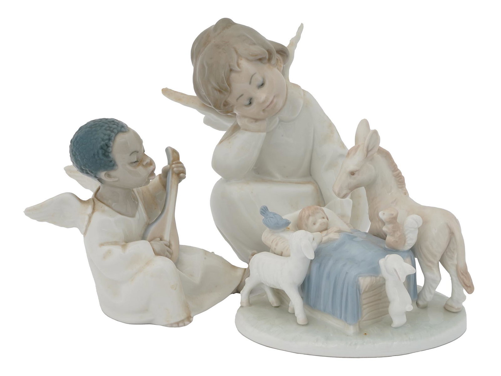 VINTAGE LLADRO ROMAN JAPAN PORCELAIN FIGURINES: Two vintage Spanish porcelain Lladro figurines depicting a resting cherub angel, an angel with a guitar, marked Lladro on bottom. Also includes a vintage porcelain Roman Japan scene with a kid in bed 