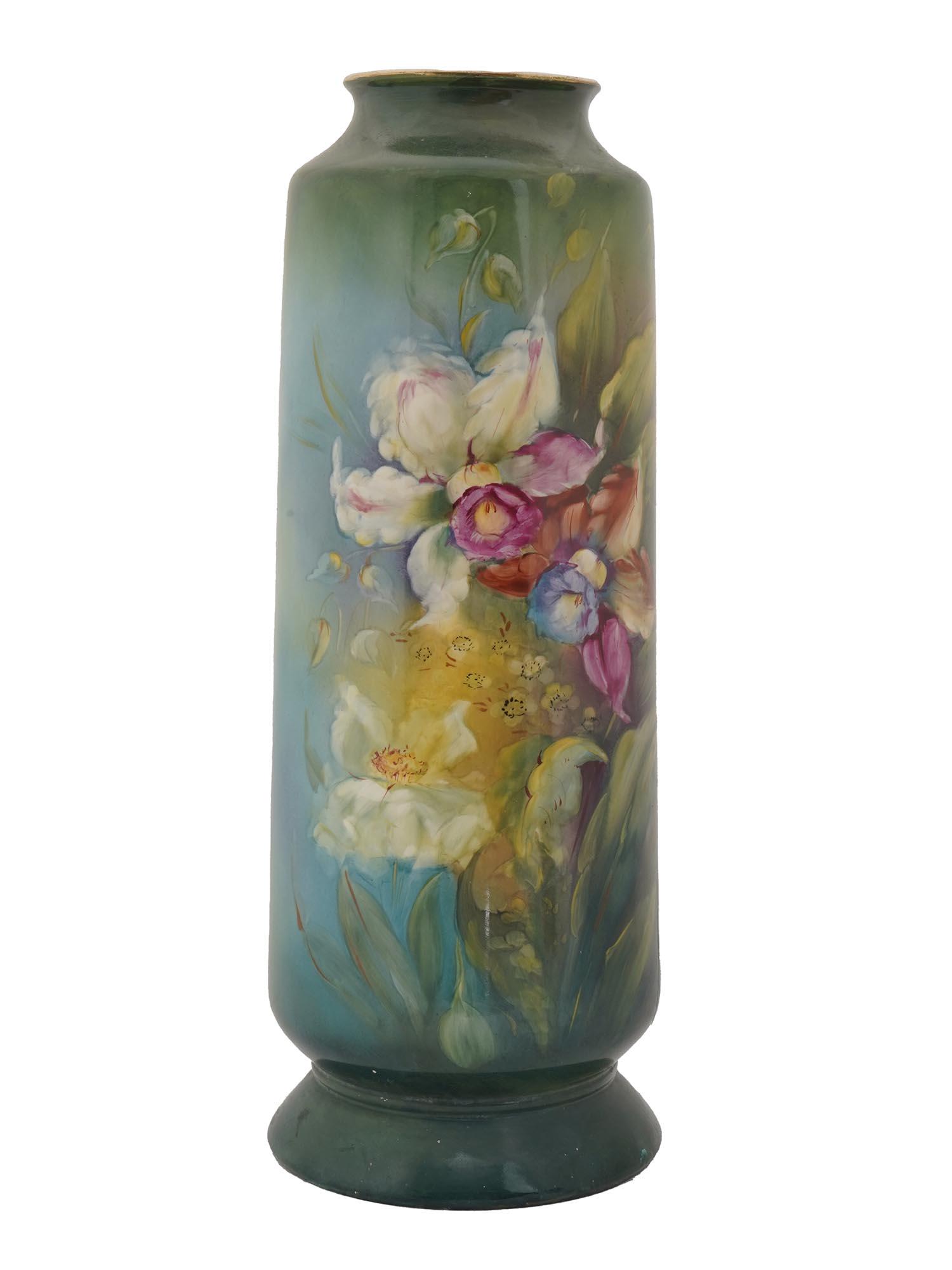 VERY TALL GERMAN ROYAL BONN FLORAL PORCELAIN VASE: A very rare porcelain vase by the German Co. Royal Bonn. The vase is adorned with painted depictions of flowers of varying colors and stages of bloom. The flowers are set against a graduating backgrou