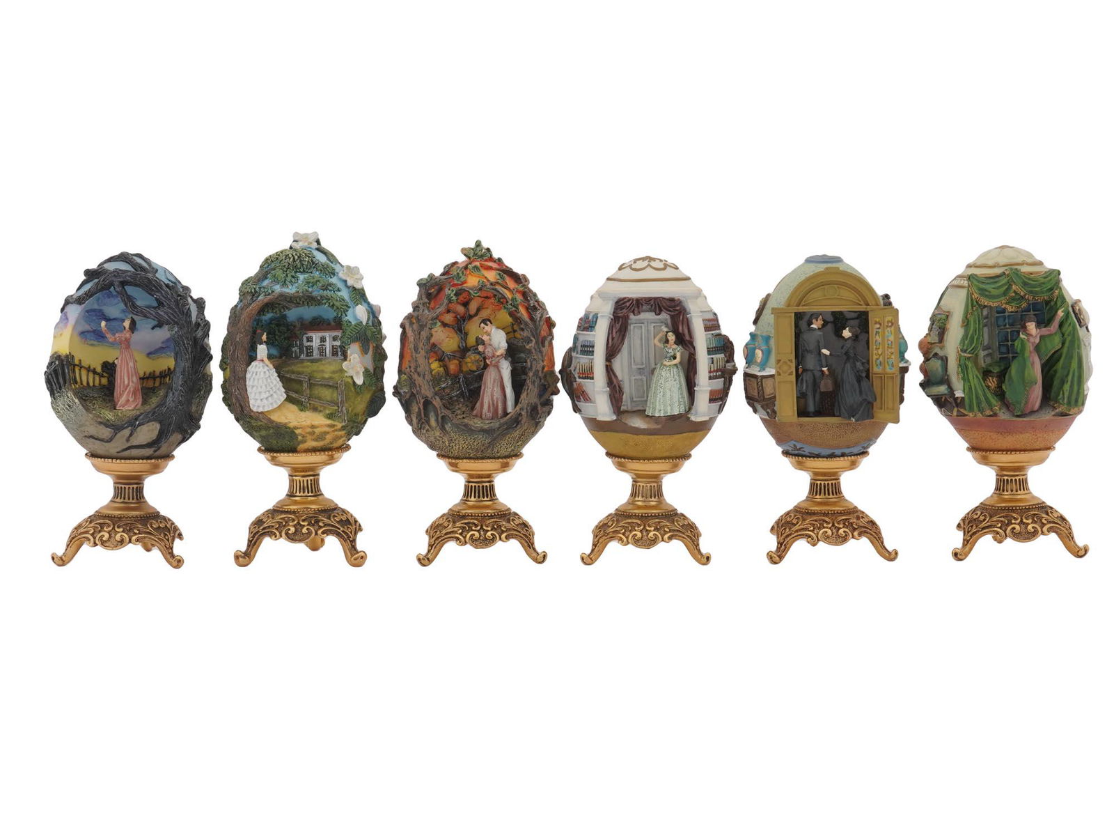 FRANKLIN MINT GONE WITH THE WIND EGG SCULPTURES: A lot of hand-painted sculptured collector's eggs by The Franklin Mint, 1990-2000s. From a series dedicated to the 1936 novel Gone with the Wind by Margaret Mitchell. A total of six items, titled Scar
