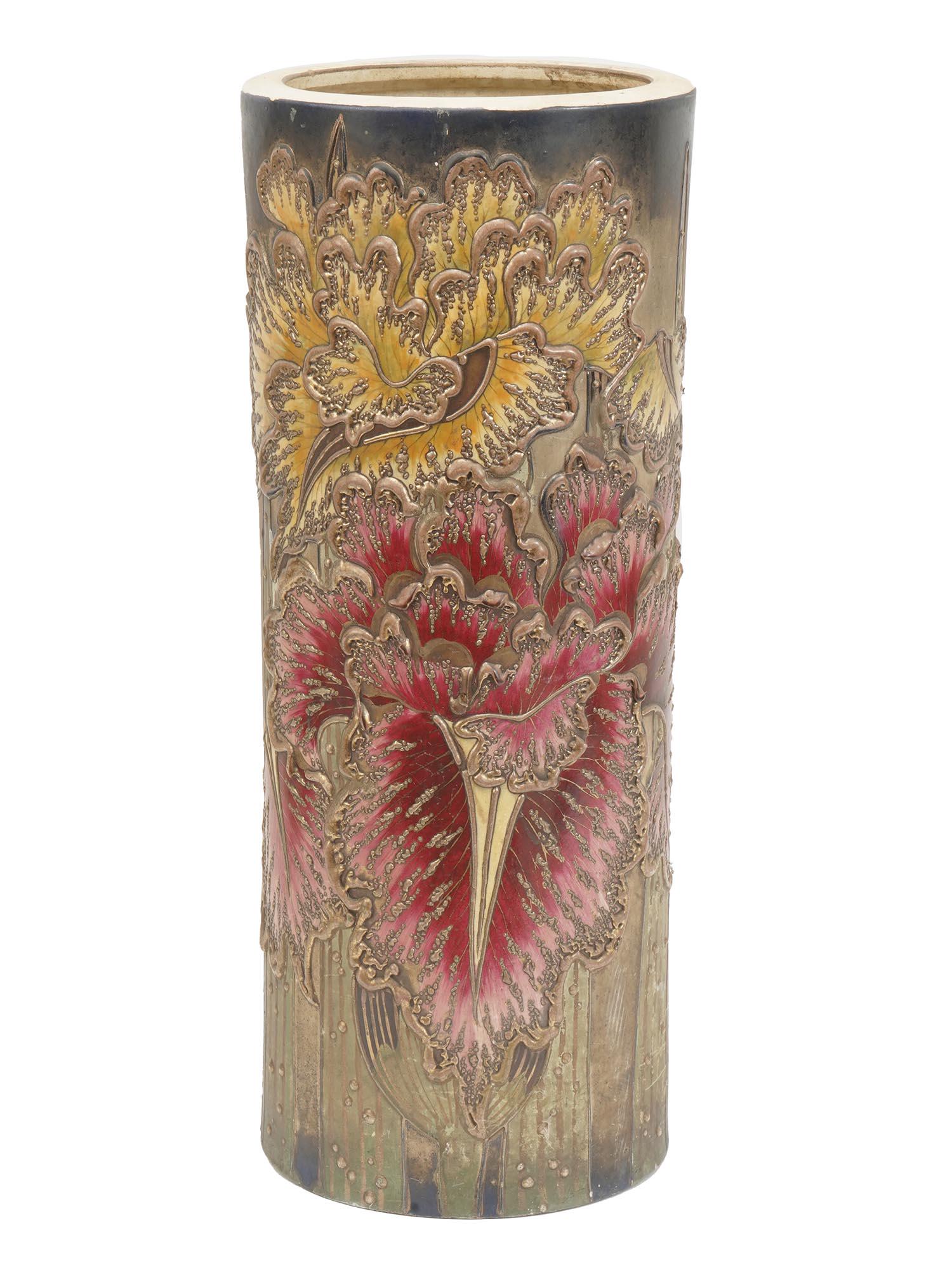 ASIAN PAINTED AND GILDED CERAMIC UMBRELLA STAND: An Asian style, probably, Chinese, ceramic umbrella stand. The exterior is painted with image of flowers and adorned with a gilding. Unmarked. Circa: 20th century. Antique and Vintage Pottery Ceramic 