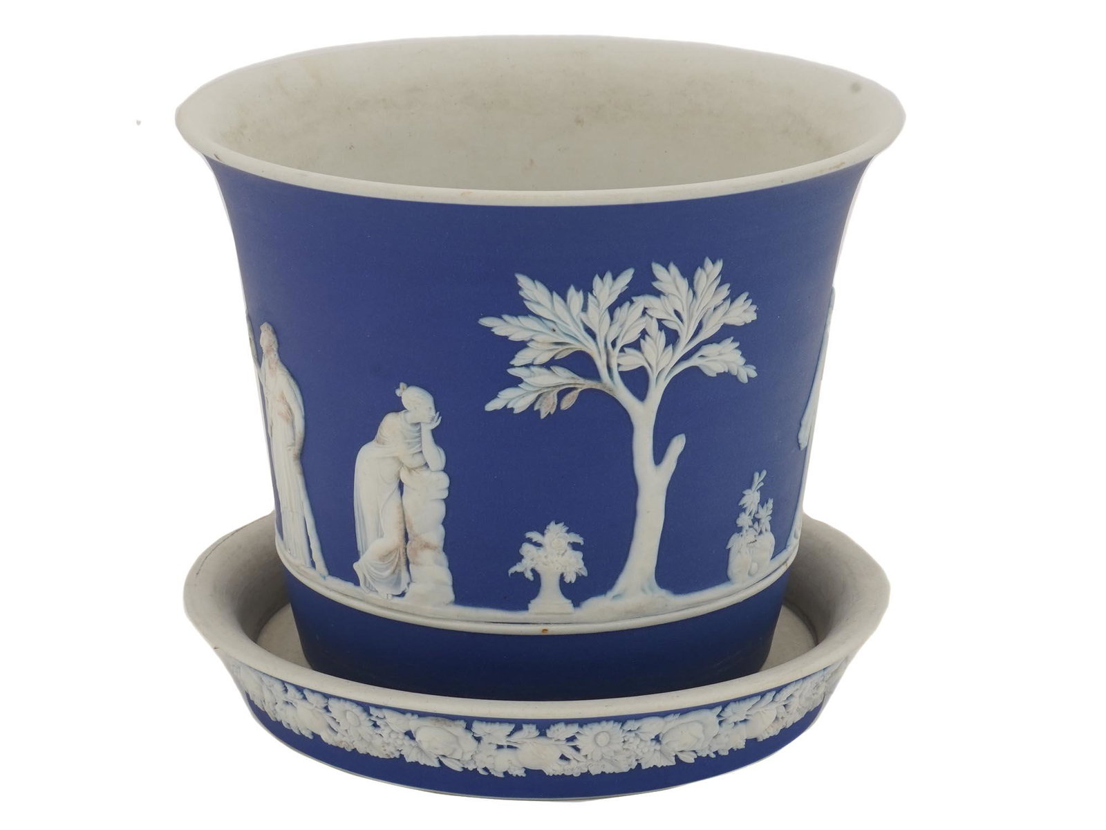 ANTIQUE WEDGWOOD COBALT BLUE JASPER WARE CACHEPOT: Antique British Neoclassical style Wedgwood cobalt blue jasper ware cache pot or planter pot with a bowl stand. The pot is decorated with Neoclassical scenes with female figures, children, cherubs, an