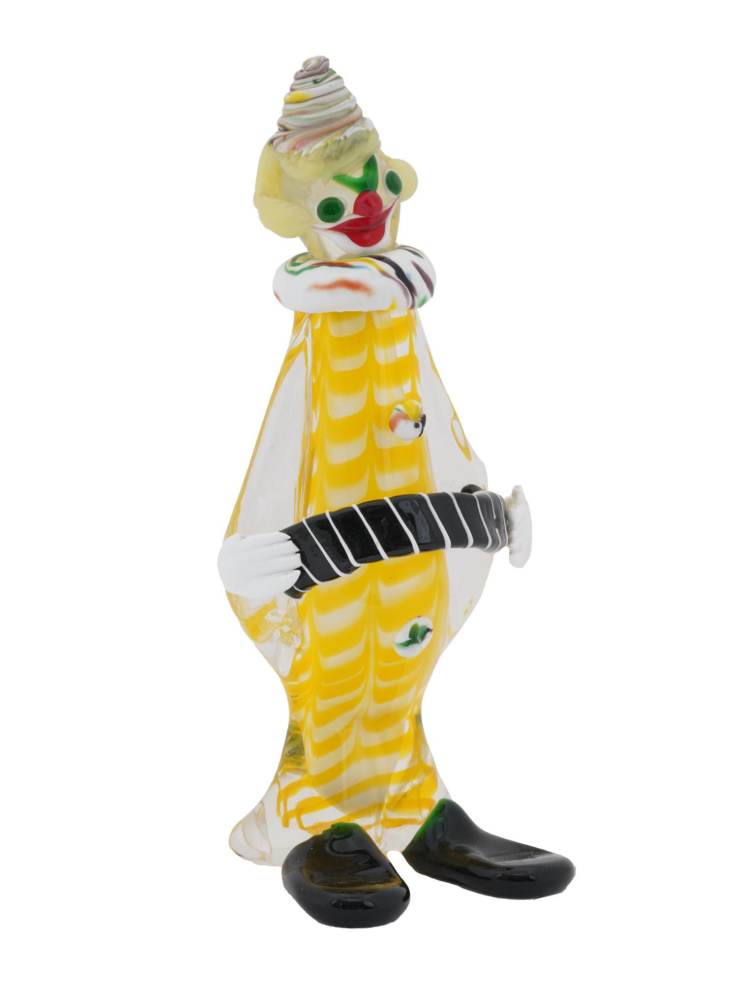 VENETIAN ART GLASS MURANO CLOWN BY J.I. CO, ITALY: A unique vintage handblown art glass clown figurine, Veneatian glass J. I. Co., Murano. Bearing an original paper label to the backside that reads: Hand Made Venetian J.I. Co, Made in Italy. Original 