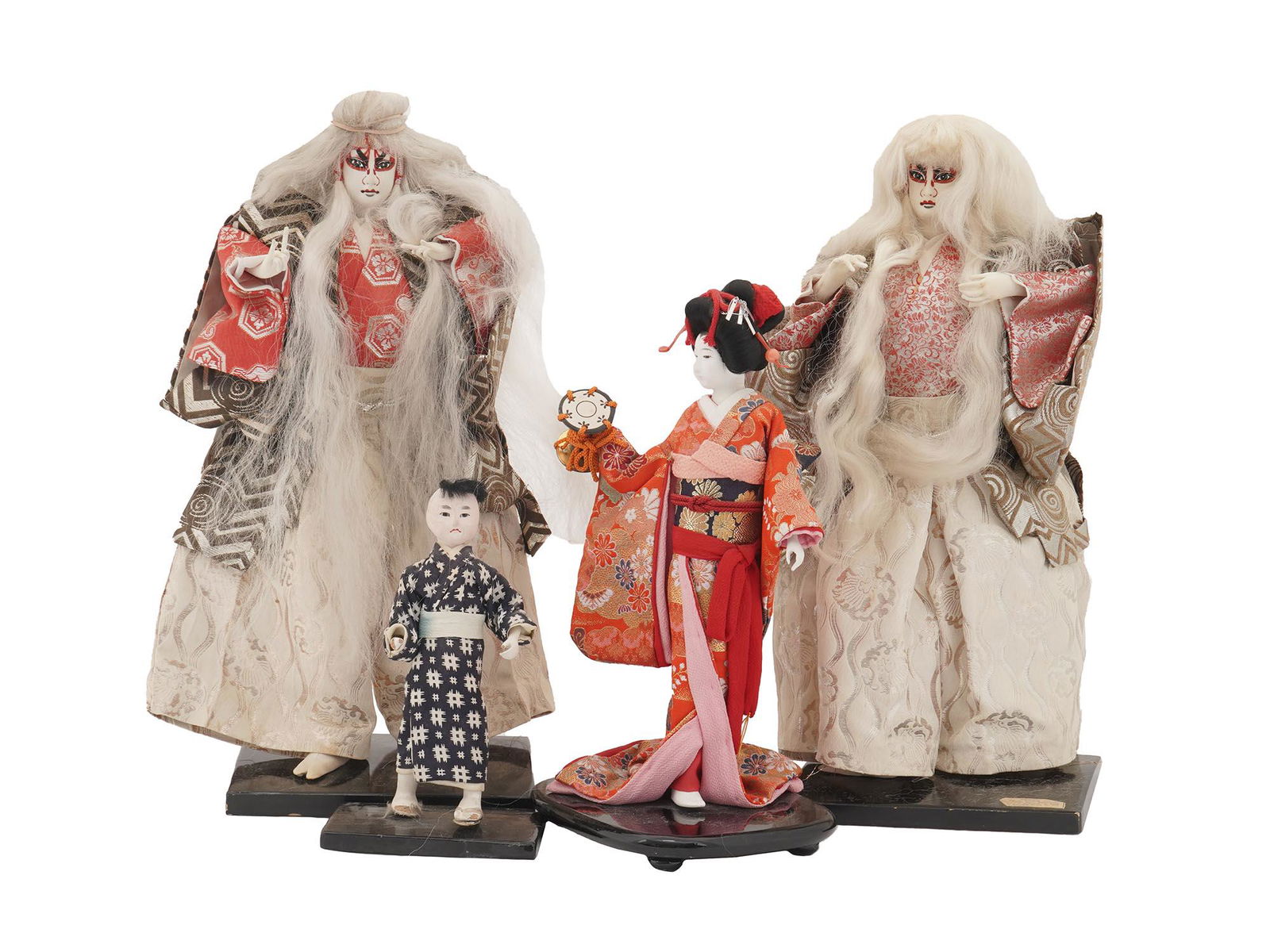 LOT OF ANTIQUE JAPANESE KABUKI AND MORE DOLLS: A collection of four antique and vintage Japanese dolls, from the early to mid 20th century. The collection includes a pair of large Japanese Kabuki dolls depicting actors with hand painted faces and