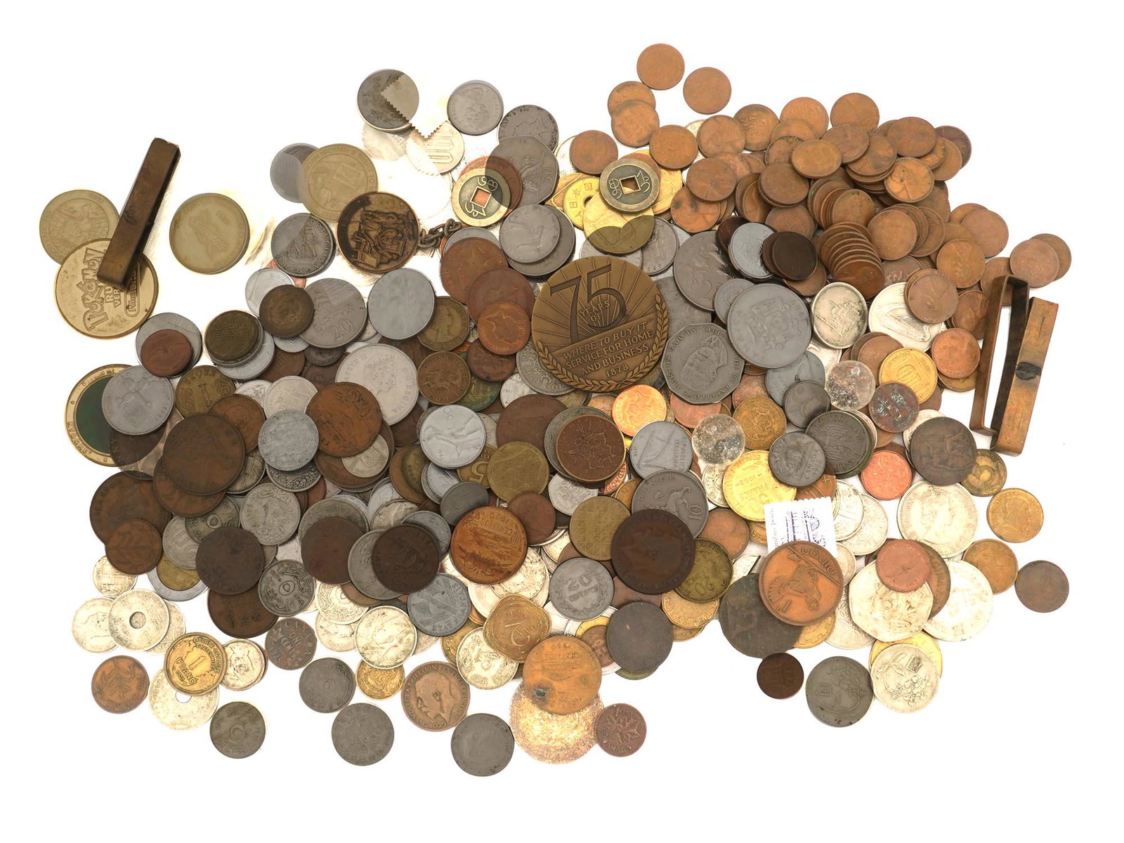 VTG WORLDWIDE NUMISMATICS EXONUMIA COLLECTIBLES: A huge collection of numismatic and exonumia items from all over the world of various sizes, denominations, shapes and compositions. Minted mostly in the mid 20th century. International Numismatic and