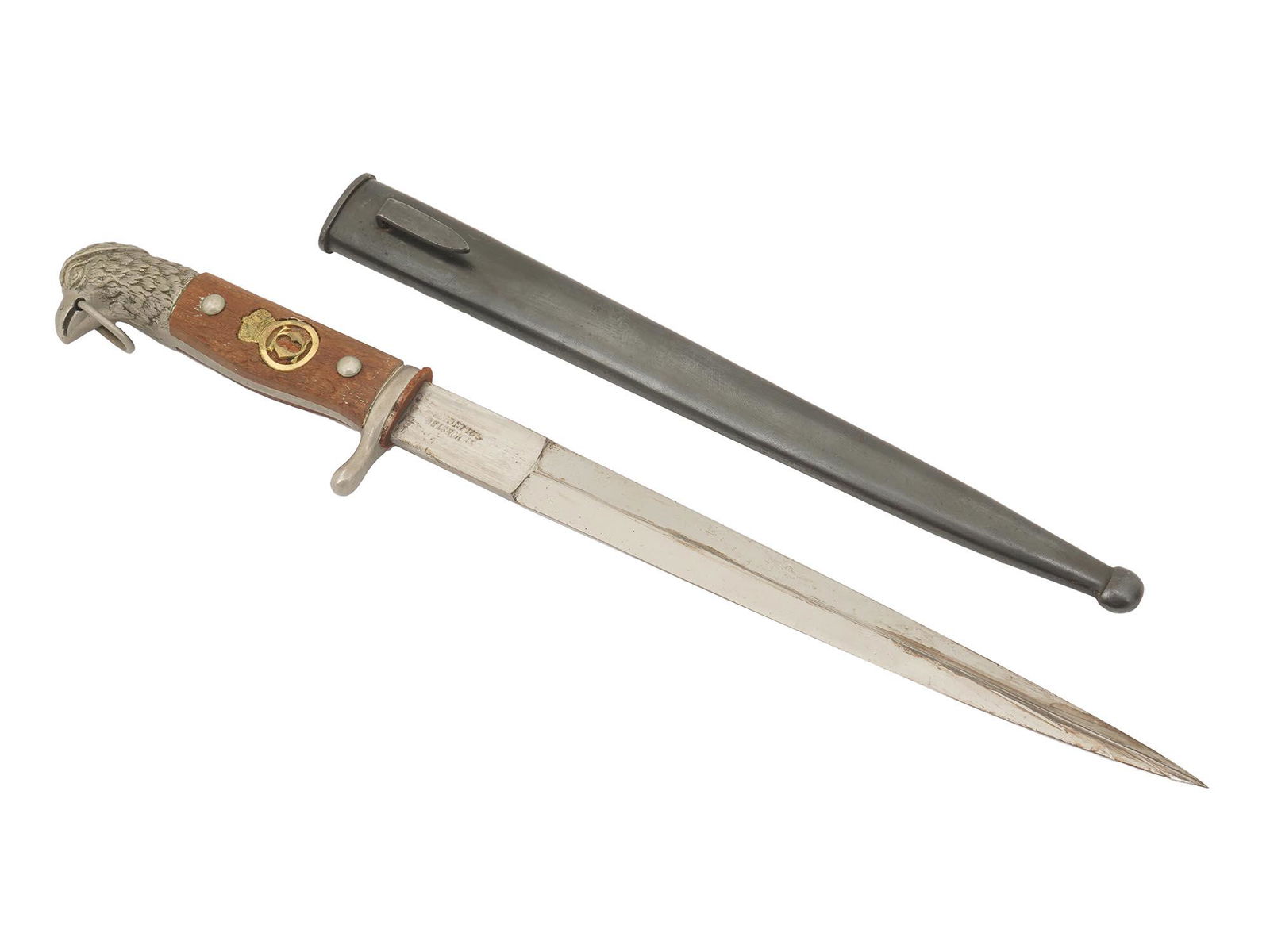 GERMAN MADE ROMANIAN WWII ARMY OFFICER DAGGER: An original German made Romanian WWII army officer dagger with Carol II cypher embedded into a wooden handle, a pommel in the shape of an eagle head with a ring, and a steel blade marked E. F. Horster
