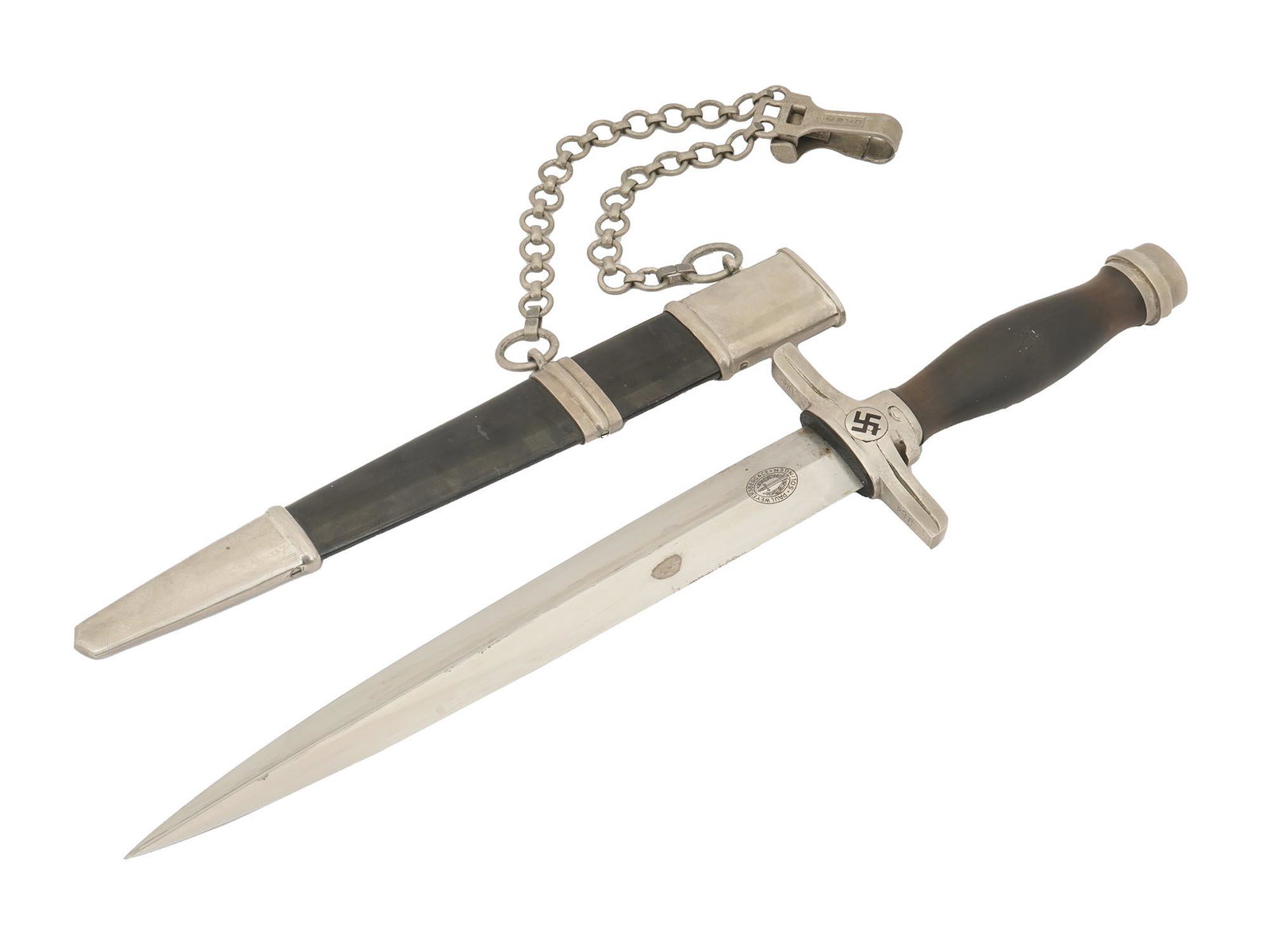 NAZI GERMAN WWII REICHSPOST POSTAL LEADER DAGGER: A rare Nazi German WWII postal leader dagger with a wood grip exhibiting a Postal pattern Nazi eagle, a cross guard fearing black enamel swastikas to both sides. The underside of the cross guard is nu