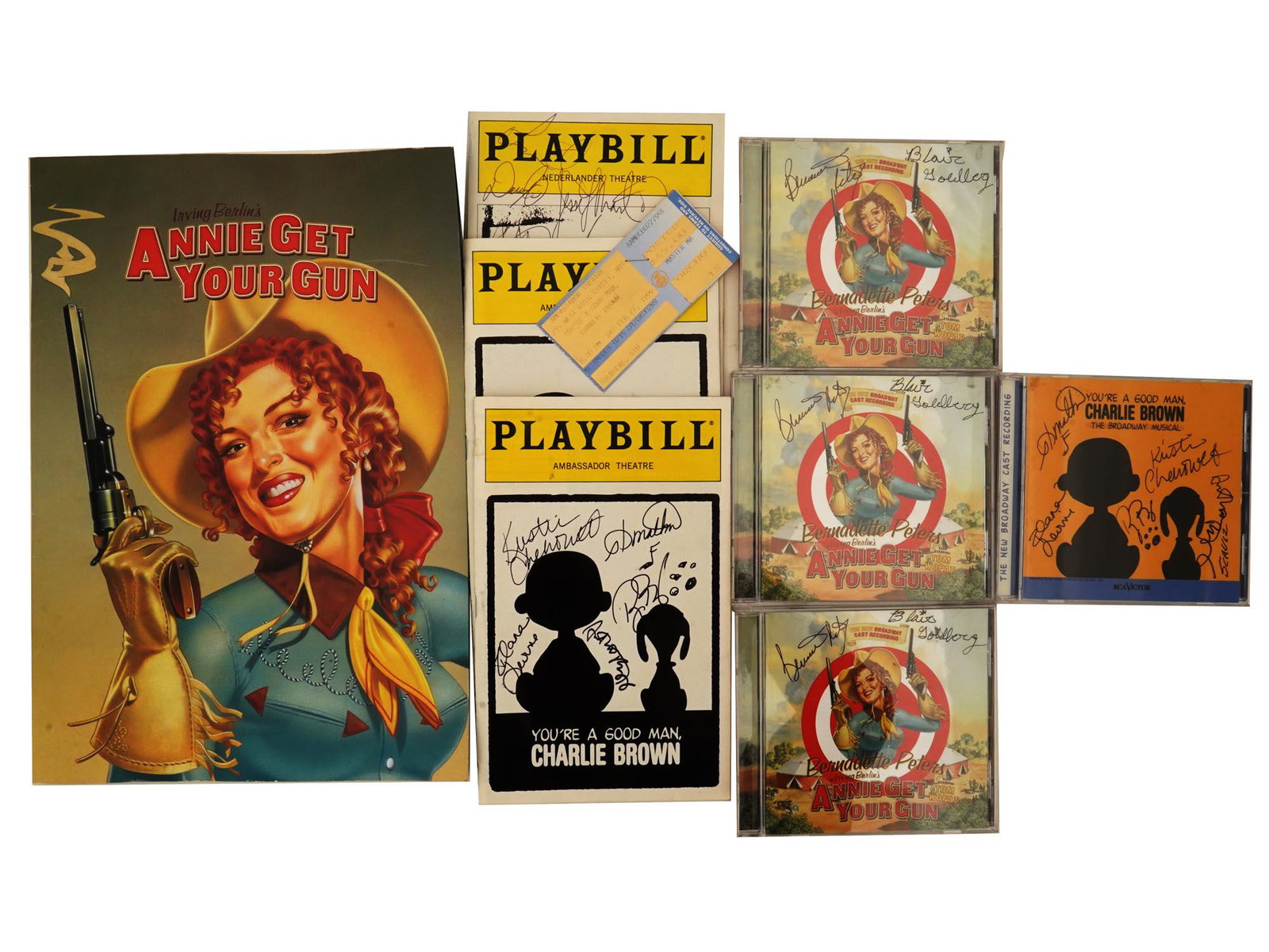 AMERICAN BROADWAY CHARLIE BROWN CDS AUTOGRAPHED: Three original 1999 Broadway Revival cast CDs of the recording of Annie Get Your Gun by Bernadette Peters and Tom Wopat, and an original 1999 CD of the recording of the Broadway musical You are A Good