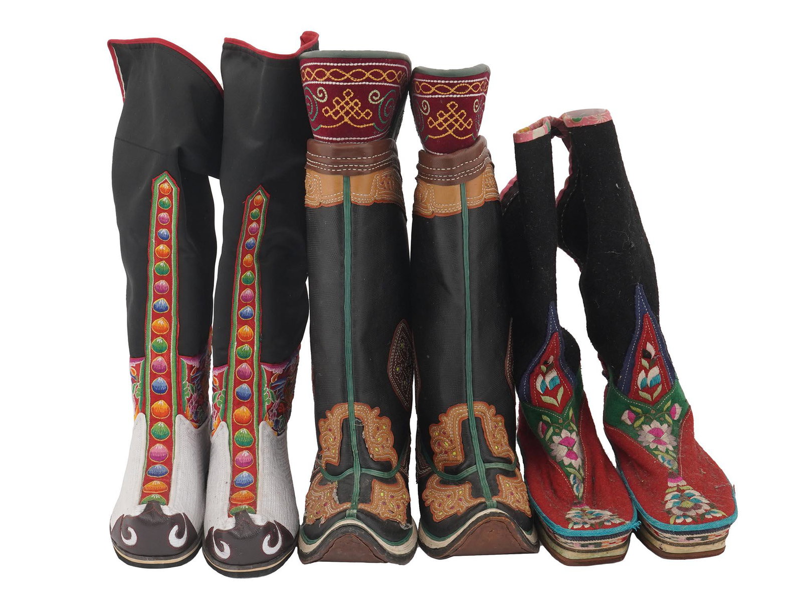 THREE PAIRS OF MONGOLIAN EMBROIDERED BOOTS: Three pairs of high quality Mongolian boots made from leather, fabric and wool, richly embroidered and decorated with original ethnic patterns. Ethnographic Footwear, Traditional Outfits For Collector