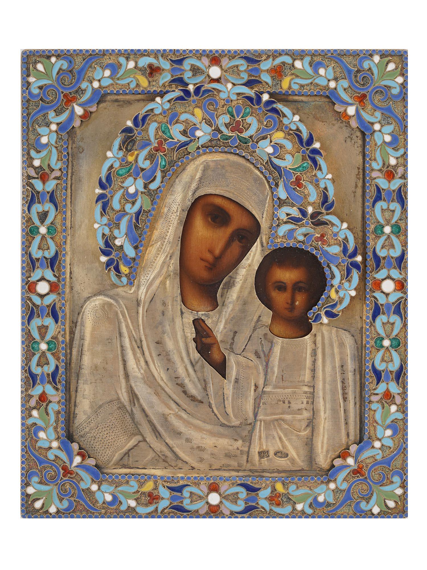 ANTIQUE RUSSIAN SILVER ENAMEL ICON MOTHER OF GOD: An antique late 19th-century Russian Orthodox icon. Mixed media painting: egg tempera, gesso, and levkas on a wood board. The icon is enclosed in a silver riza or oklad with polychrome enamel decorati