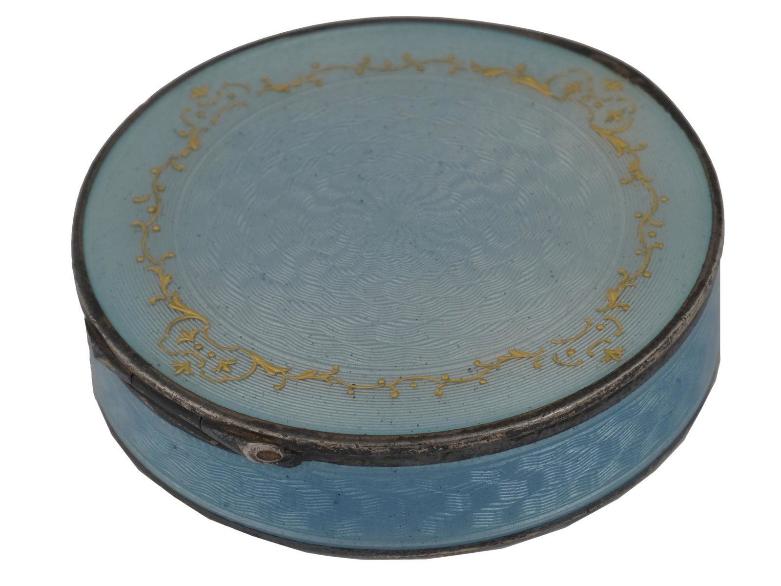 ANTIQUE AUSTRIAN SILVER GUILLOCHE ENAMEL PILL BOX: An antique late 19th - early 20th-century Austrian silver pill box. Manufactured for the Russian market. A round box with a hinged lid covered with light blue guilloche enamel and decorated with a gol