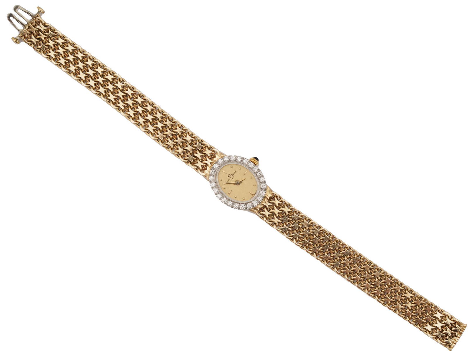 BAUME ET MERCIER 14K GOLD AND DIAMOND WRIST WATCH: A vintage 14K yellow gold ladies wristwatch by Baume & Mercier, a Swiss clock manufacturer. The golden oval dial with dagger and round indexes is framed with diamonds. A sapphire gemstone decorates th