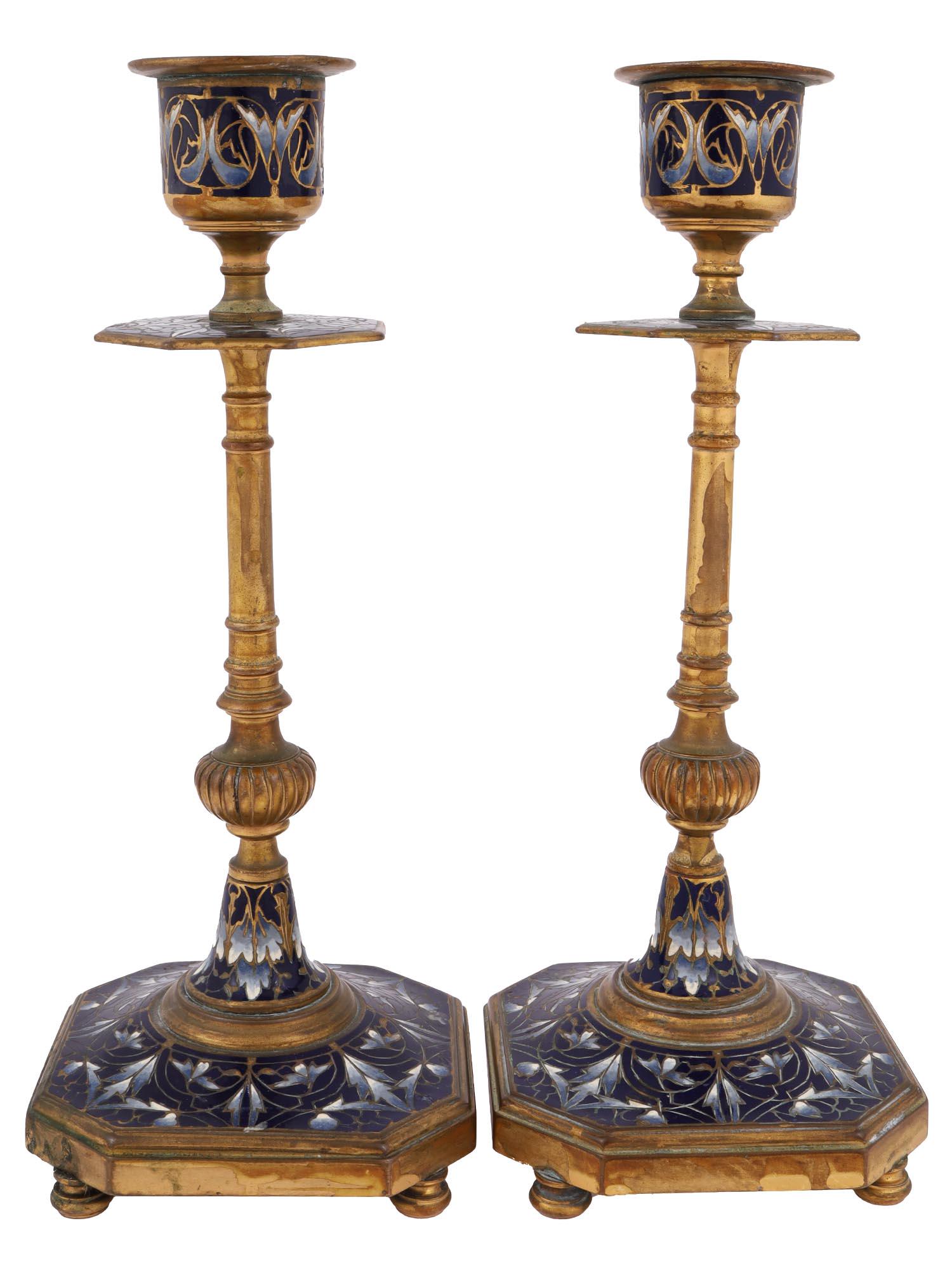 ANTIQUE PAIR OF FRENCH ENAMEL CANDLESTICKS C.1880: A fine pair of French solid brass candlesticks with shaded champleve enamel foliage on cobalt ground decor to the bowls, stems and bases. European Metalware, Decorative Antiques And Collectibles, Room