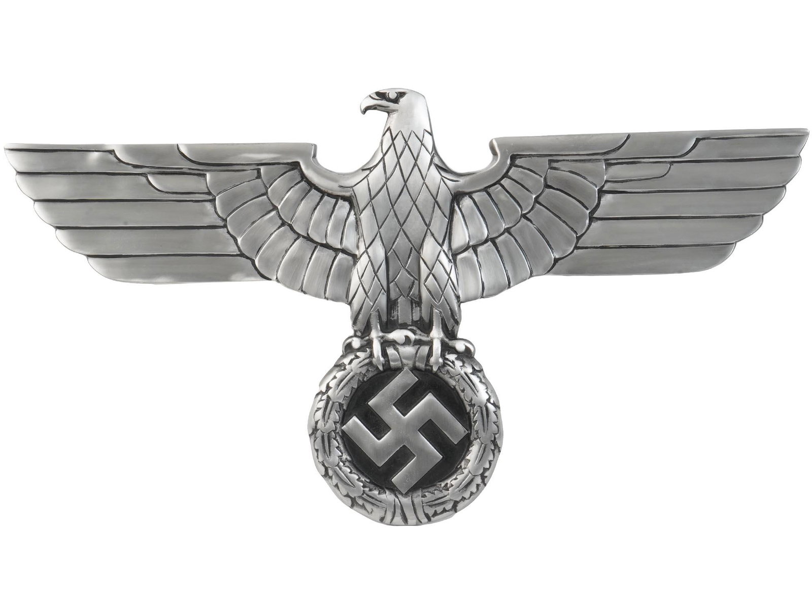 NAZI GERMAN WWII RAILROAD EAGLE SWASTIKA EMBLEM: A Nazi German WWII Deutsche Reichsbahn railroad emblem made of aluminum featuring the German Imperial eagle looking to its right shoulder. A stylized eagle combined with the Nazi swastika was made the
